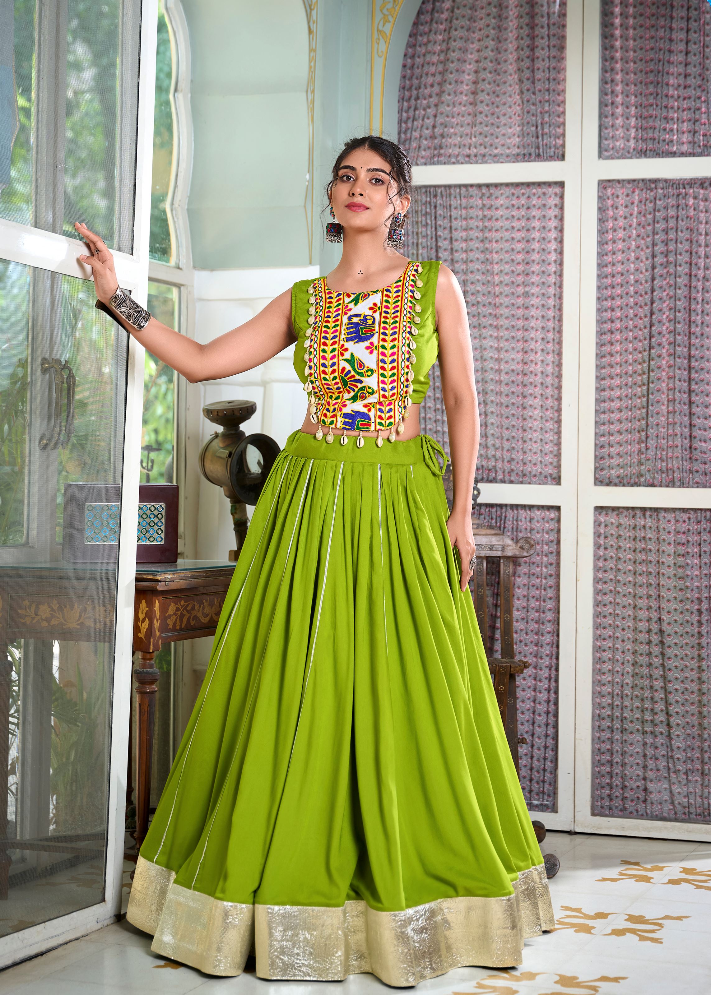 Parrot Classic Rayon Lehenga Choli with Gota Patti and Lace Accents