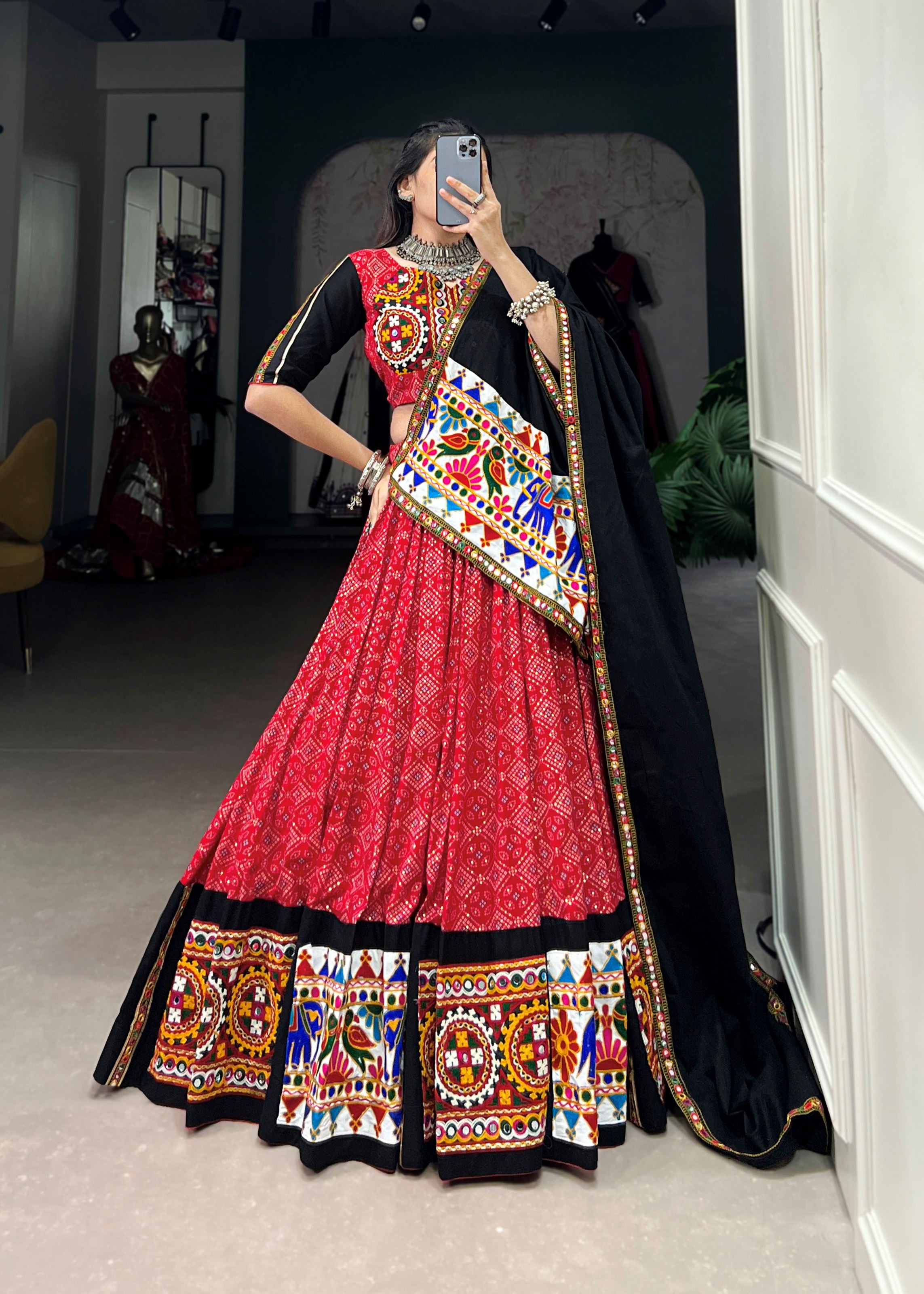 Red Where Tradition Meets Trend: Printed Pure Cotton Lehenga Cholis with Gamthi & Mirror Work"