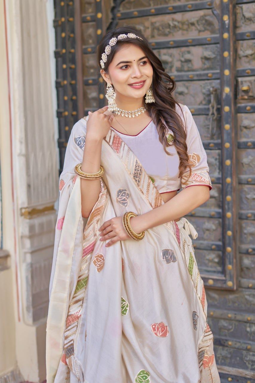 Off-White Lehenga Choli with Sequins, Thread Embroidery, Hand Print & Lace Detailing