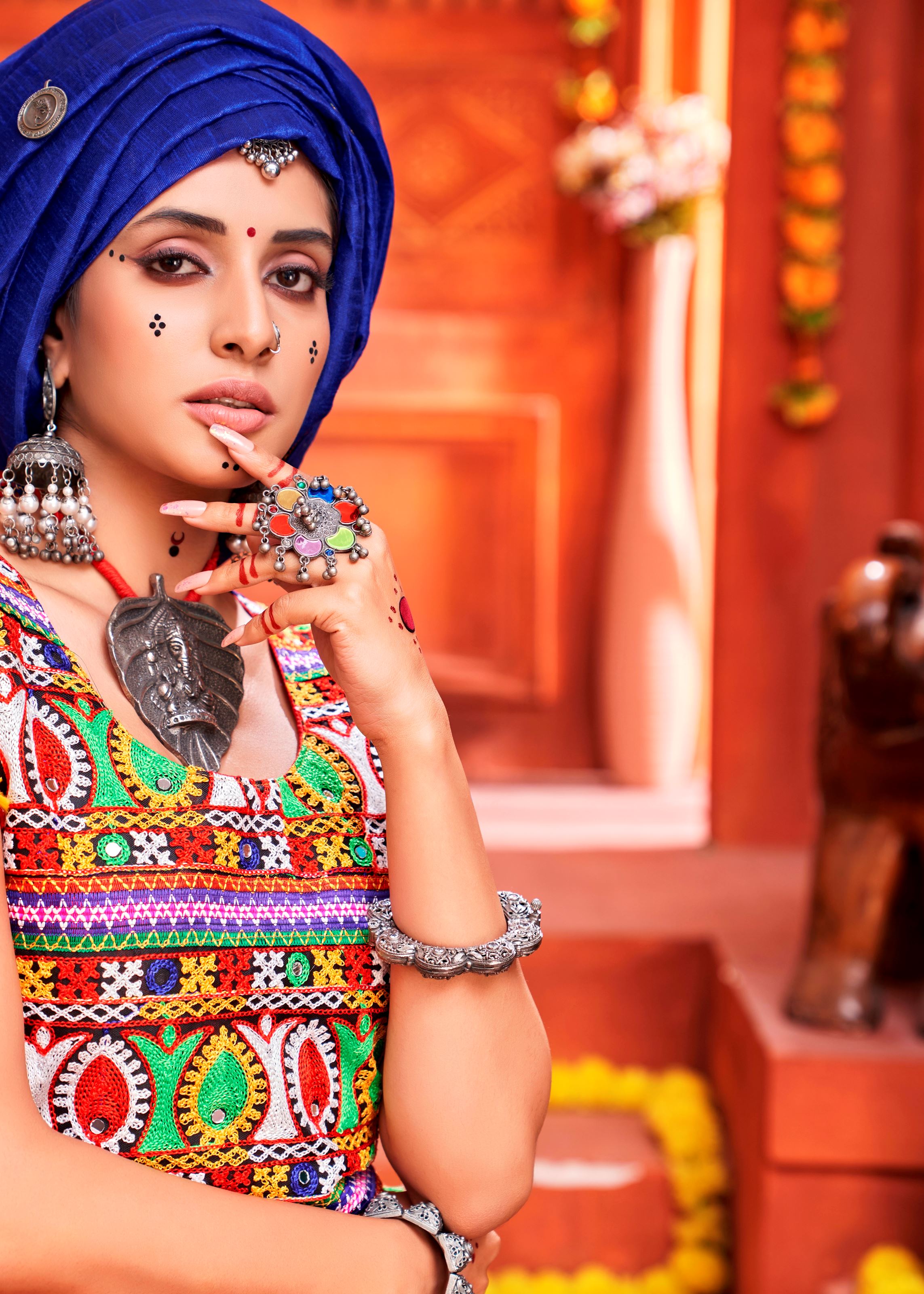 Orange And Royal Blue Navratri Chaniya Choli With Laheriya Print With Gamthi Work And Real Mirror Work