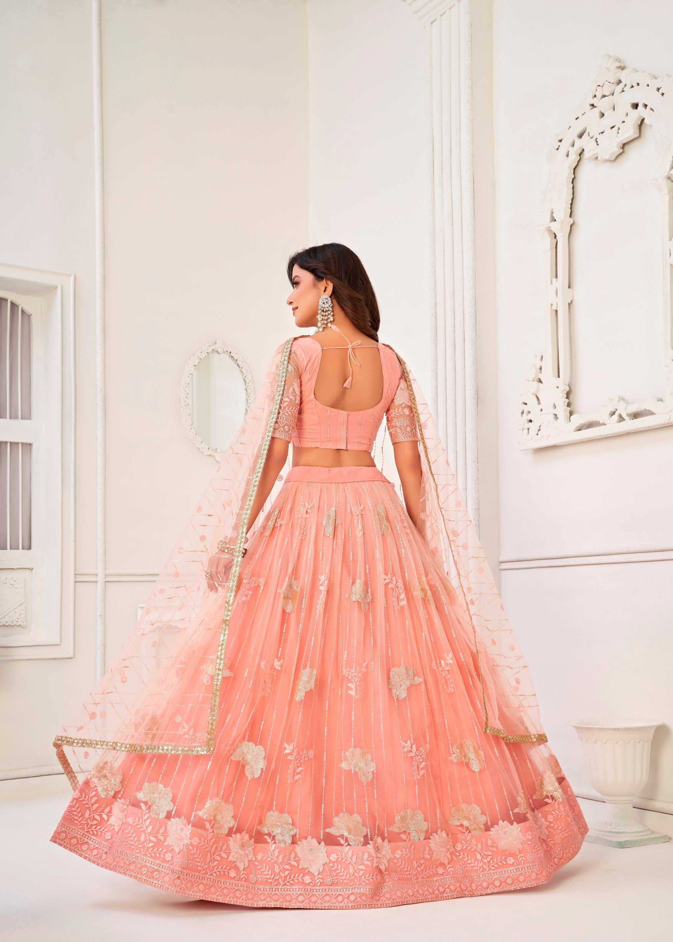 Peach Butterfly Net Lehenga Choli With Tone To Tone Thread Embroidery And Sequins Work