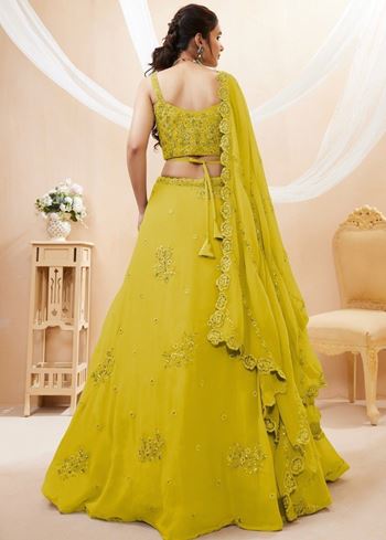 Adorable Neon Yellow Sequins Georgette Wedding Wear Lehenga Choli