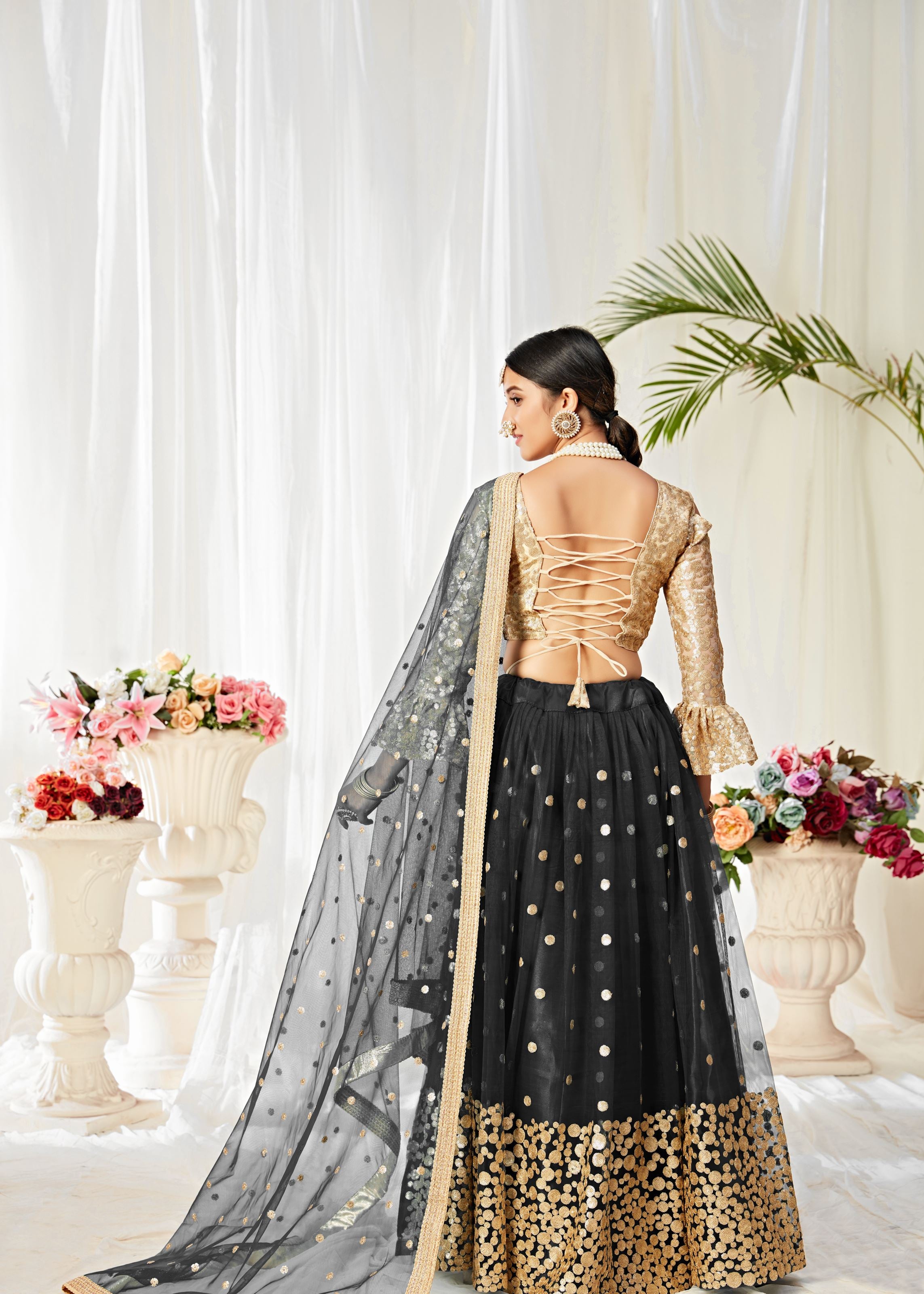 Black And Golden Lehenga Choli With Sequins And Thread Embroidered Work
