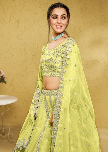 Captivating Lime Yellow Foil Work Net Engagement Wear Lehenga Choli