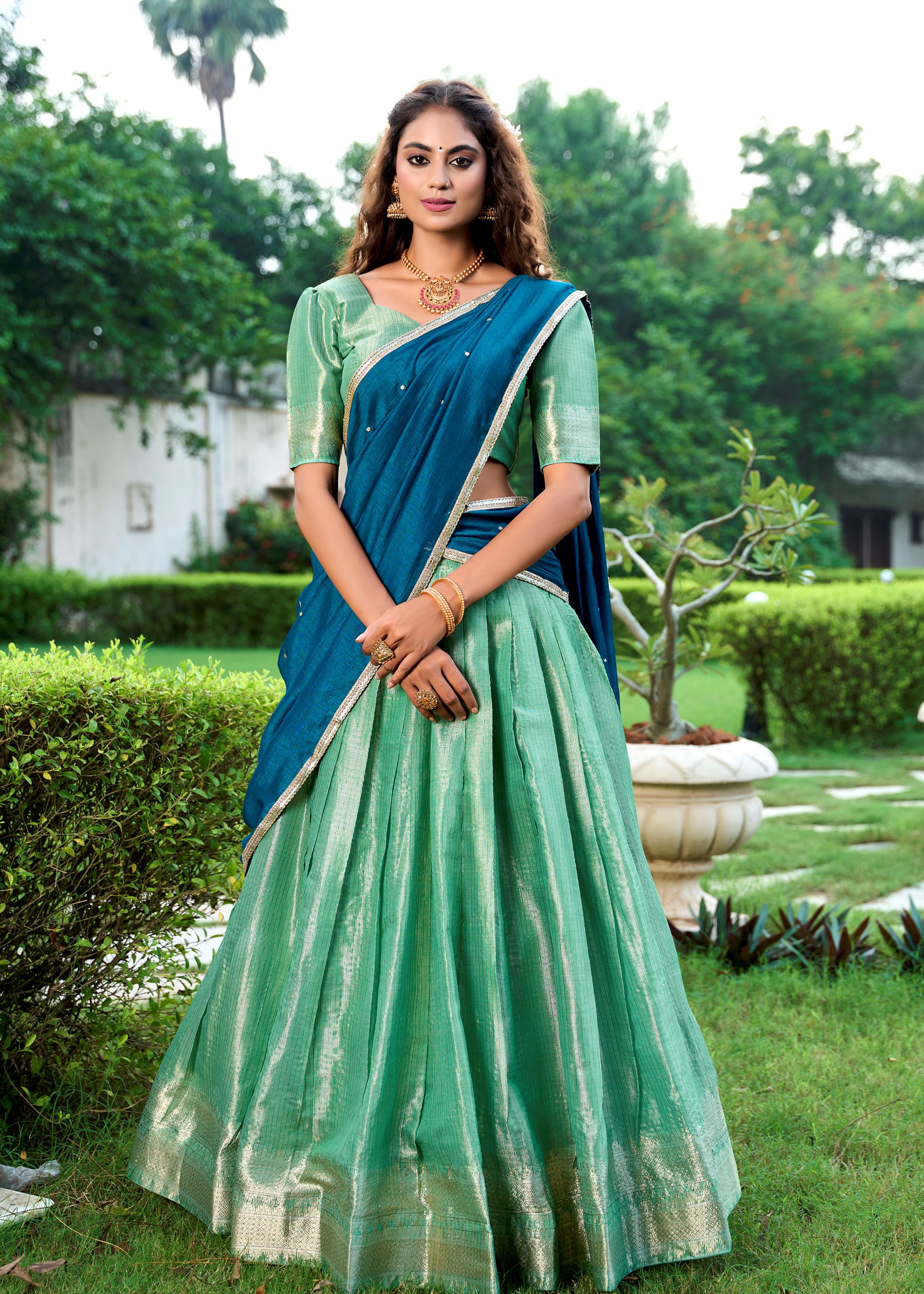 Classic Pista Elegance With A Touch Of Tradition Kanchipuram Lehenga