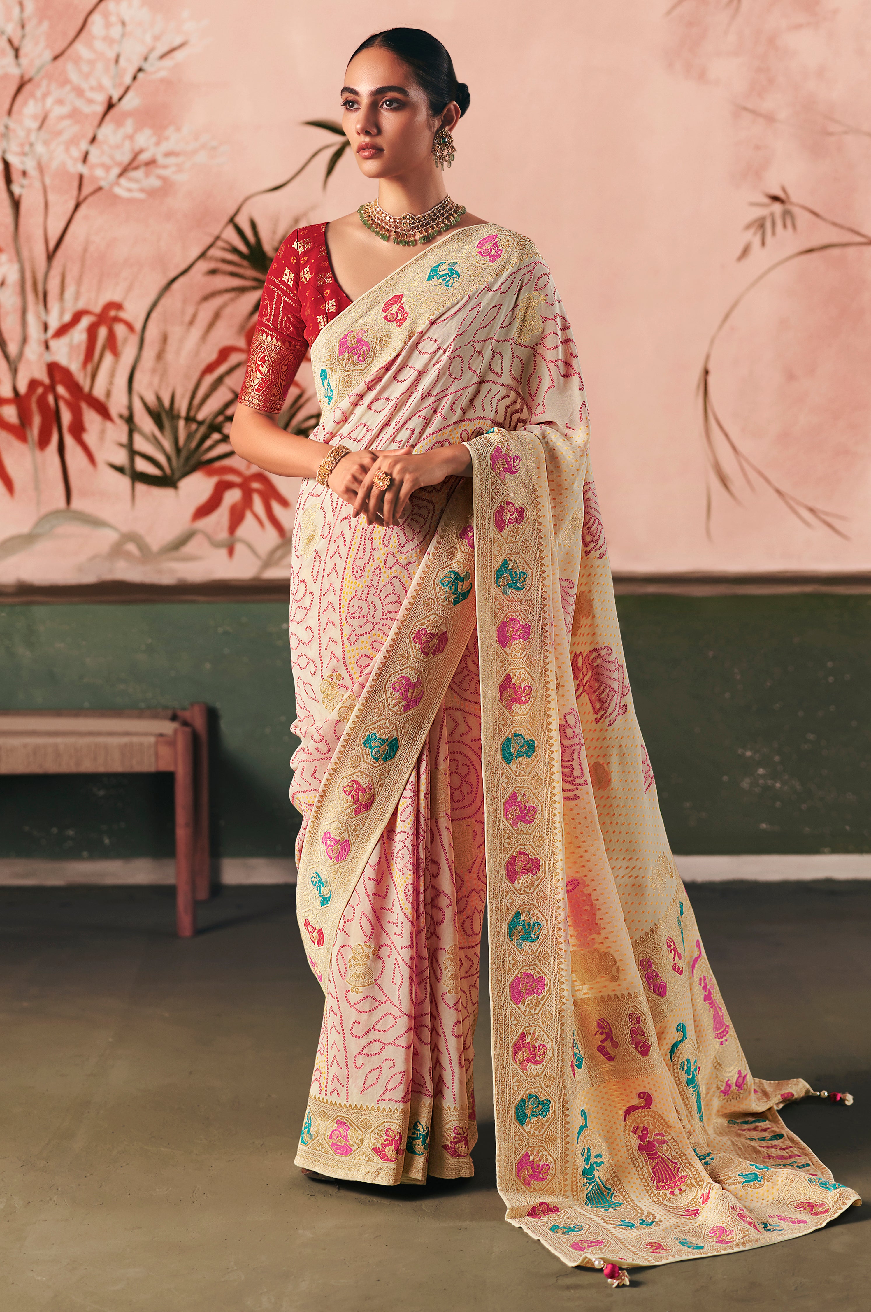 Cream Saree With Designer Bandhej Weaving Work With Beutifull Tassles Attached