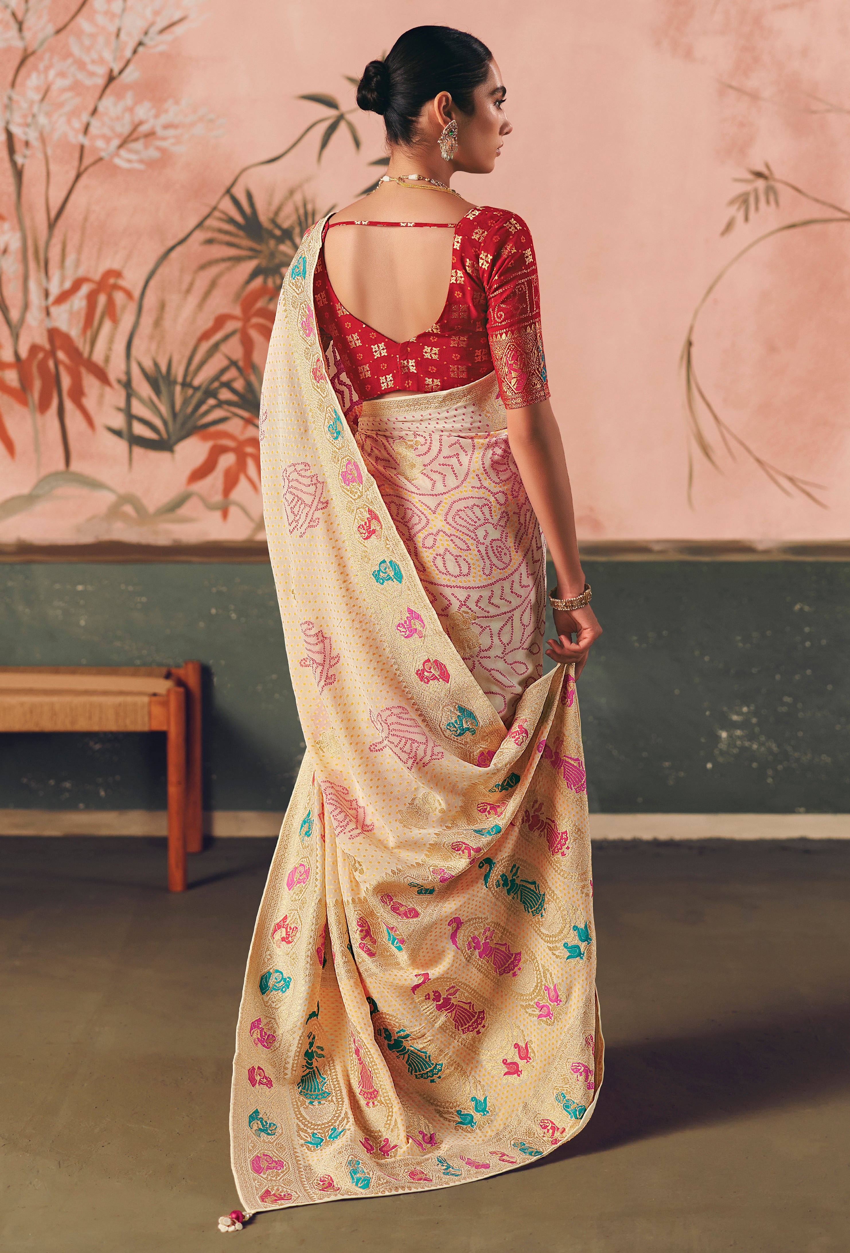 Cream Saree With Designer Bandhej Weaving Work With Beutifull Tassles Attached