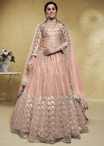 Fascinating Dusty Pink Foil Work Net Bridesmaid Lehenga Choli