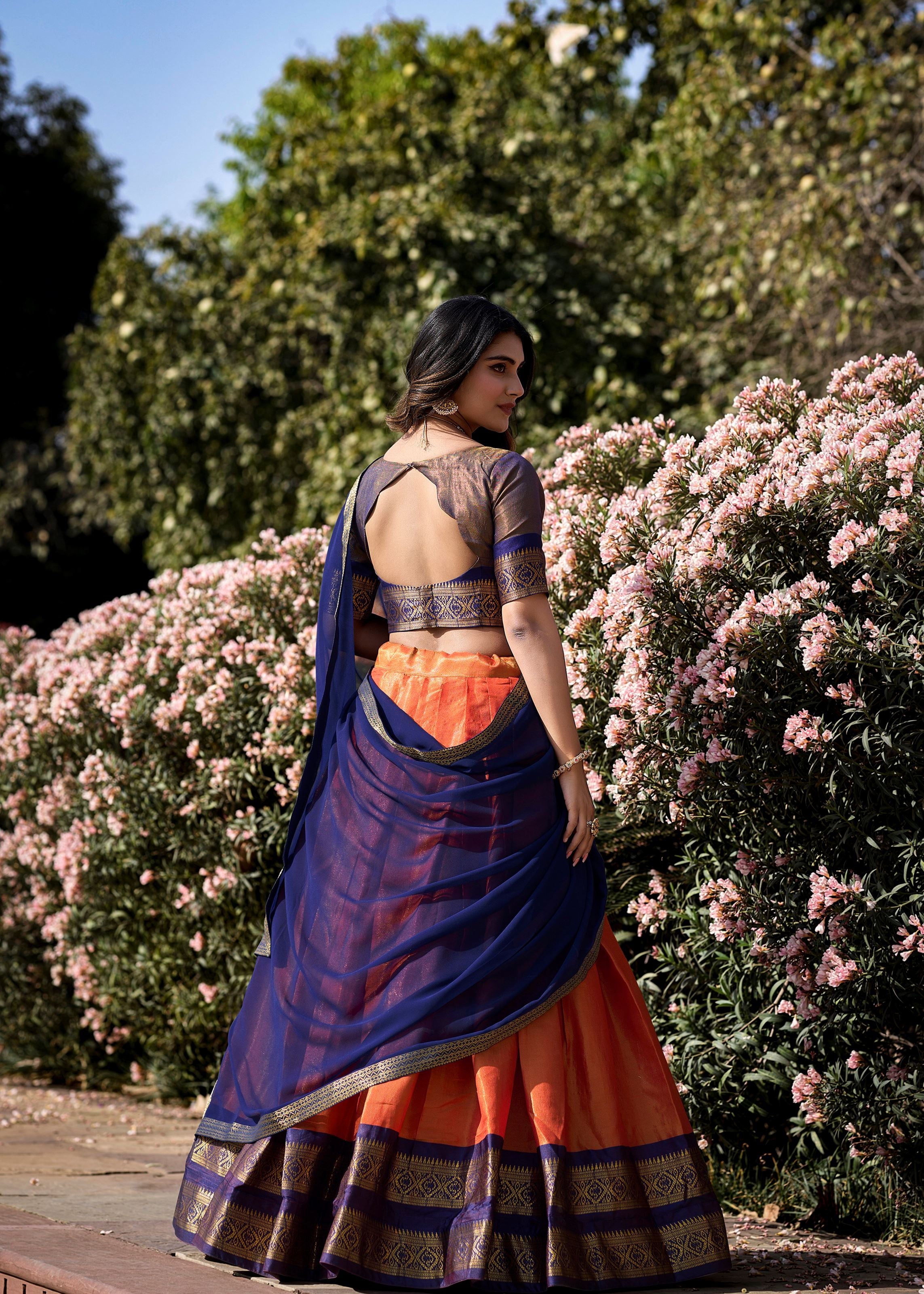 Golden Glow Zari Woven Orange Kanchipuram Lehenga for Festive Grandeur
