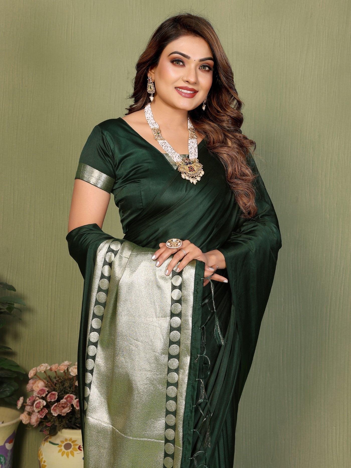 Green Soft Satin Silk Saree With Traditional Zari Weaving