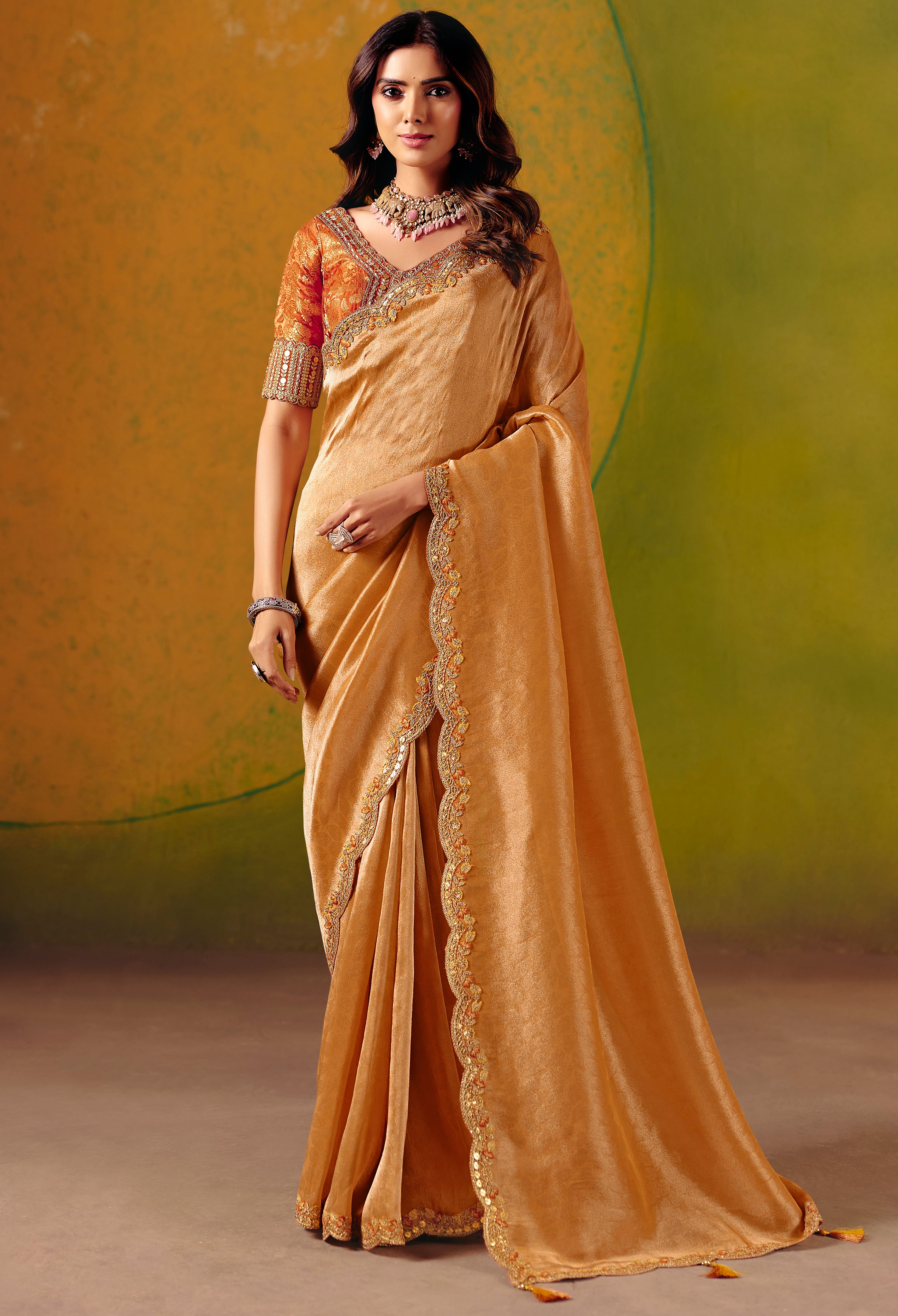 Light Orange Saree With Zari Weaving With Fancy Work Border
