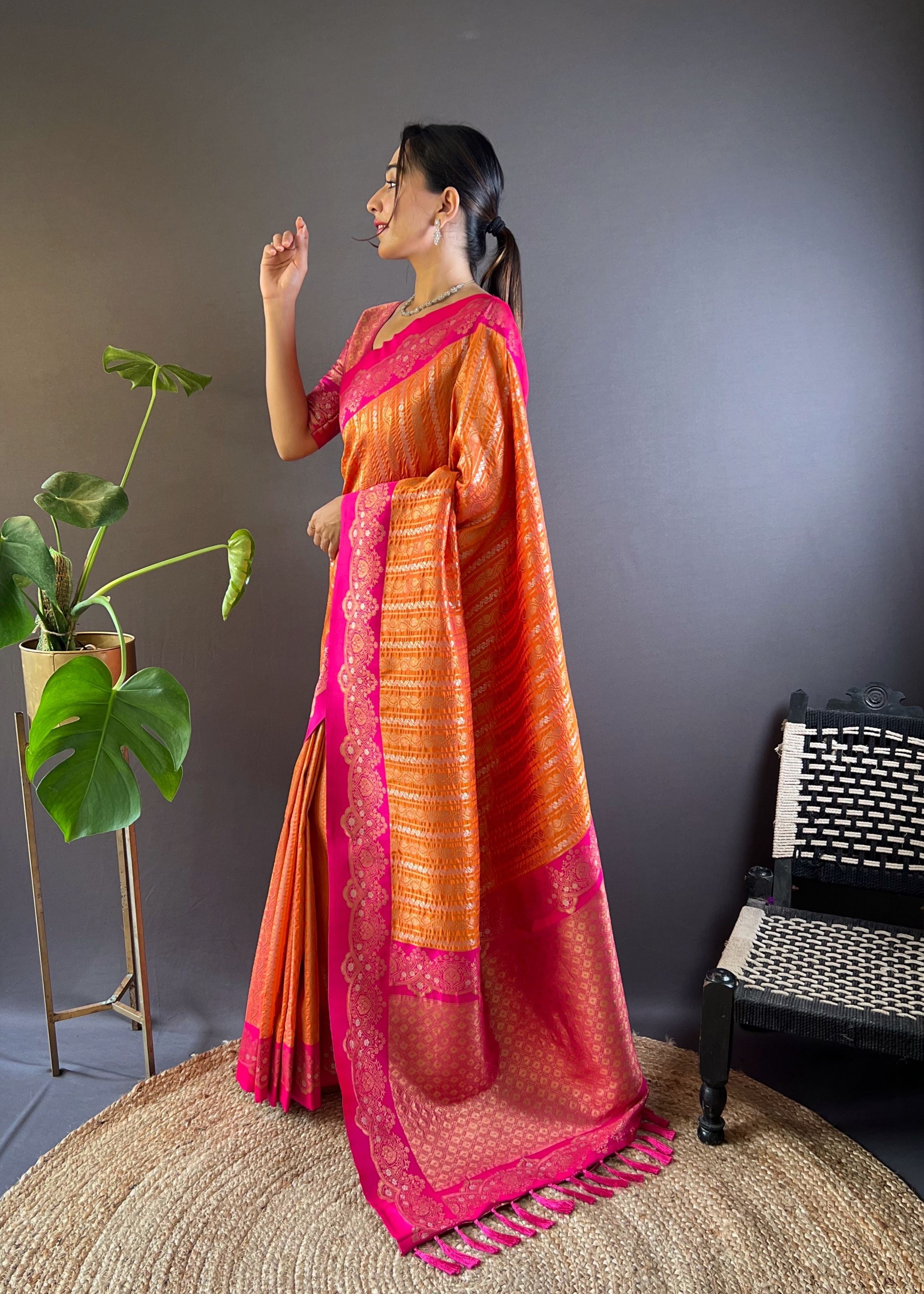 Orange Silk Blend Saree With Zari and Woven Work