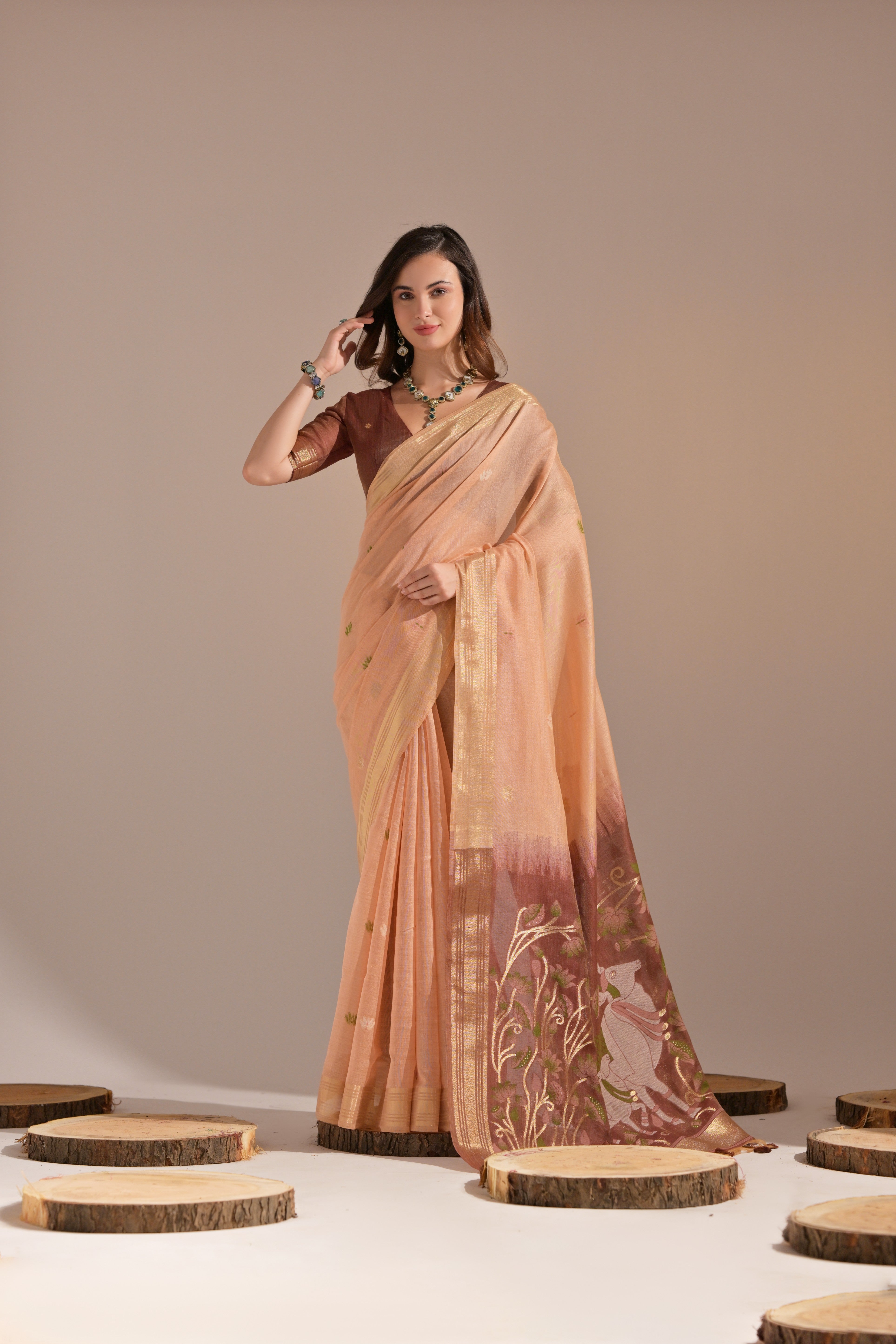 Peach Muga Cotton Saree with Cow Design and Butti Weaves
