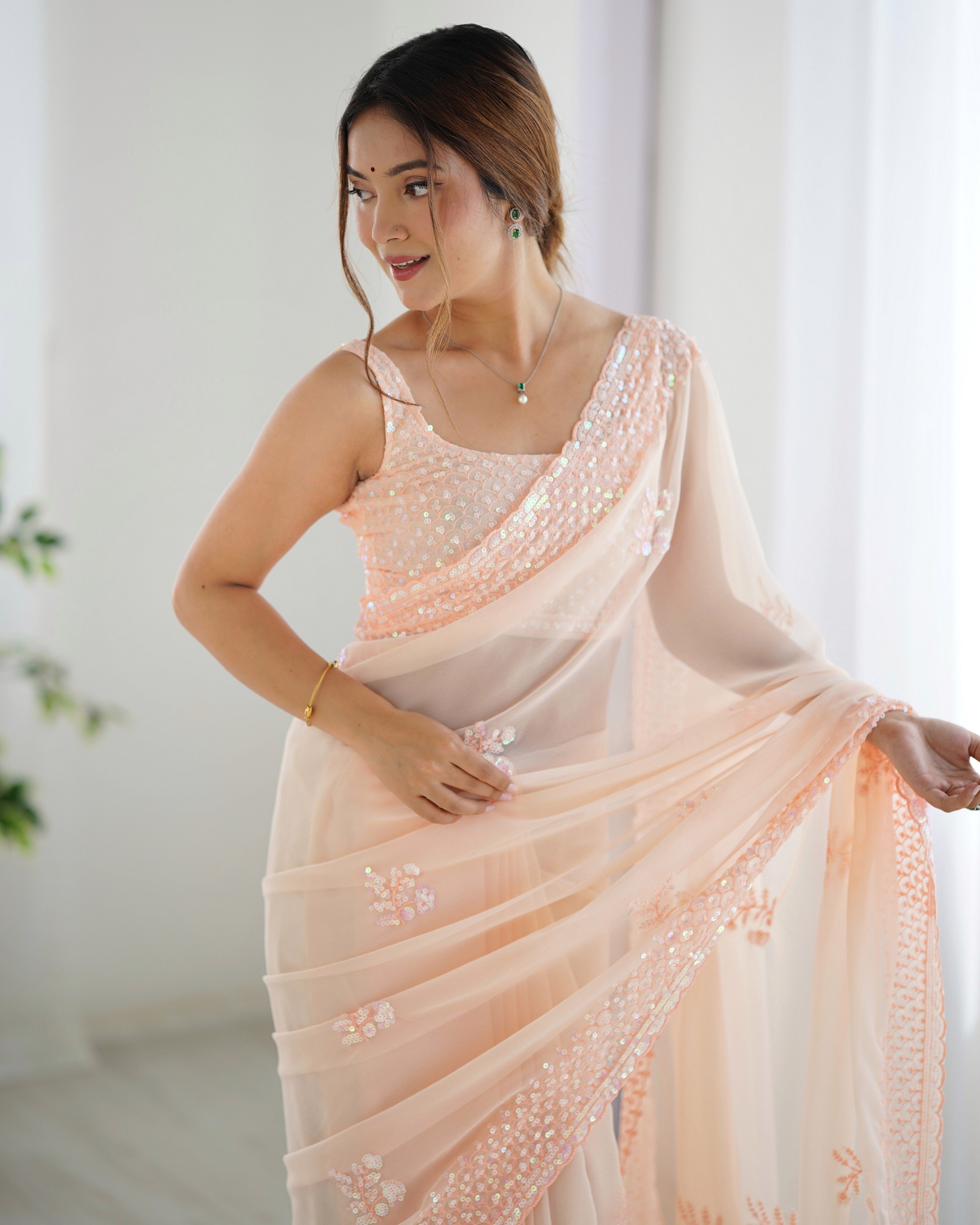 Peach Smart And Sparkling Bollywood Party Style Sequins Work Saree