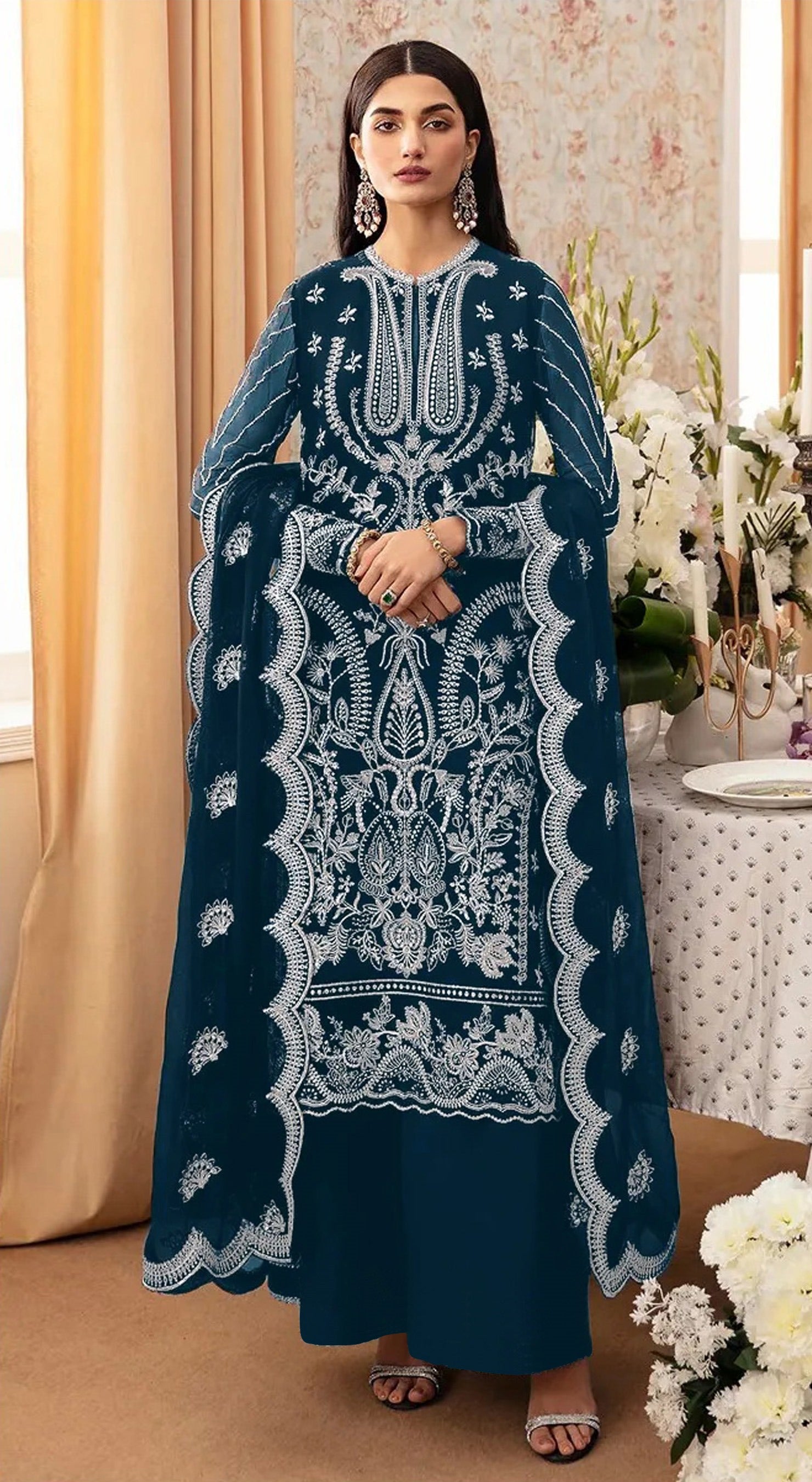 Rama Pakistani Salwar Suit With Heavy Embroidery Work