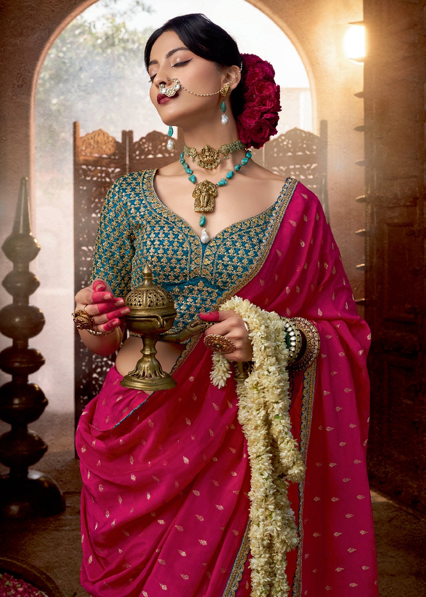 Rani Pink Viscose Crepe Saree with Butti Weaving and Embroidered Blouse