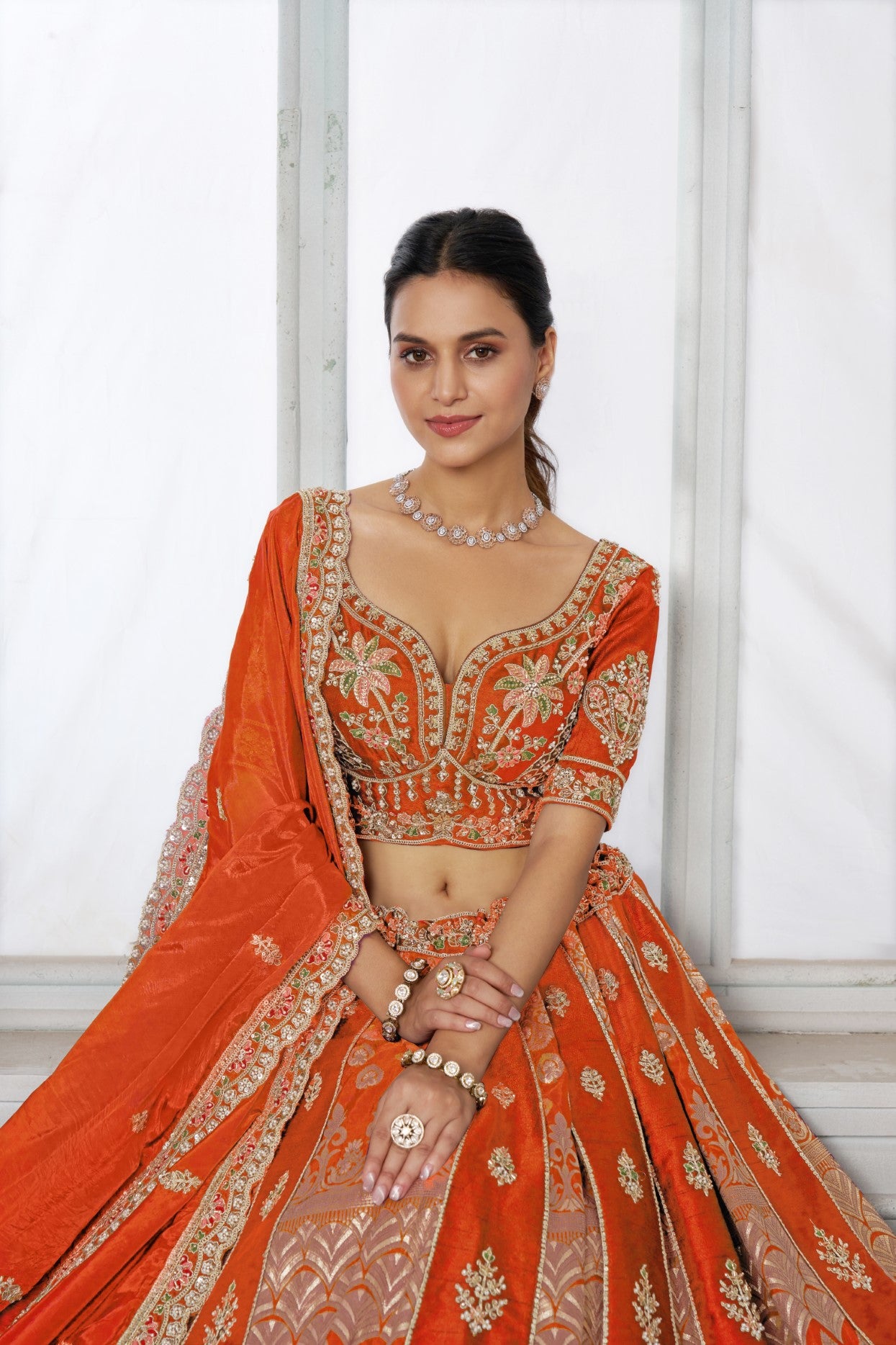 Rust Raw Silk Artisan Embroidered Designer Lehenga Choli