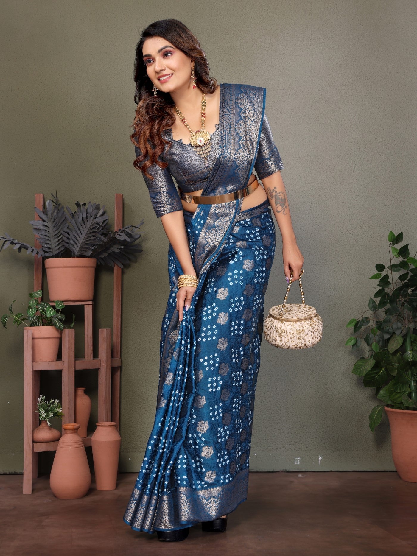 Teal Blue Bandhej Silk Saree With Classic Zari Weaving