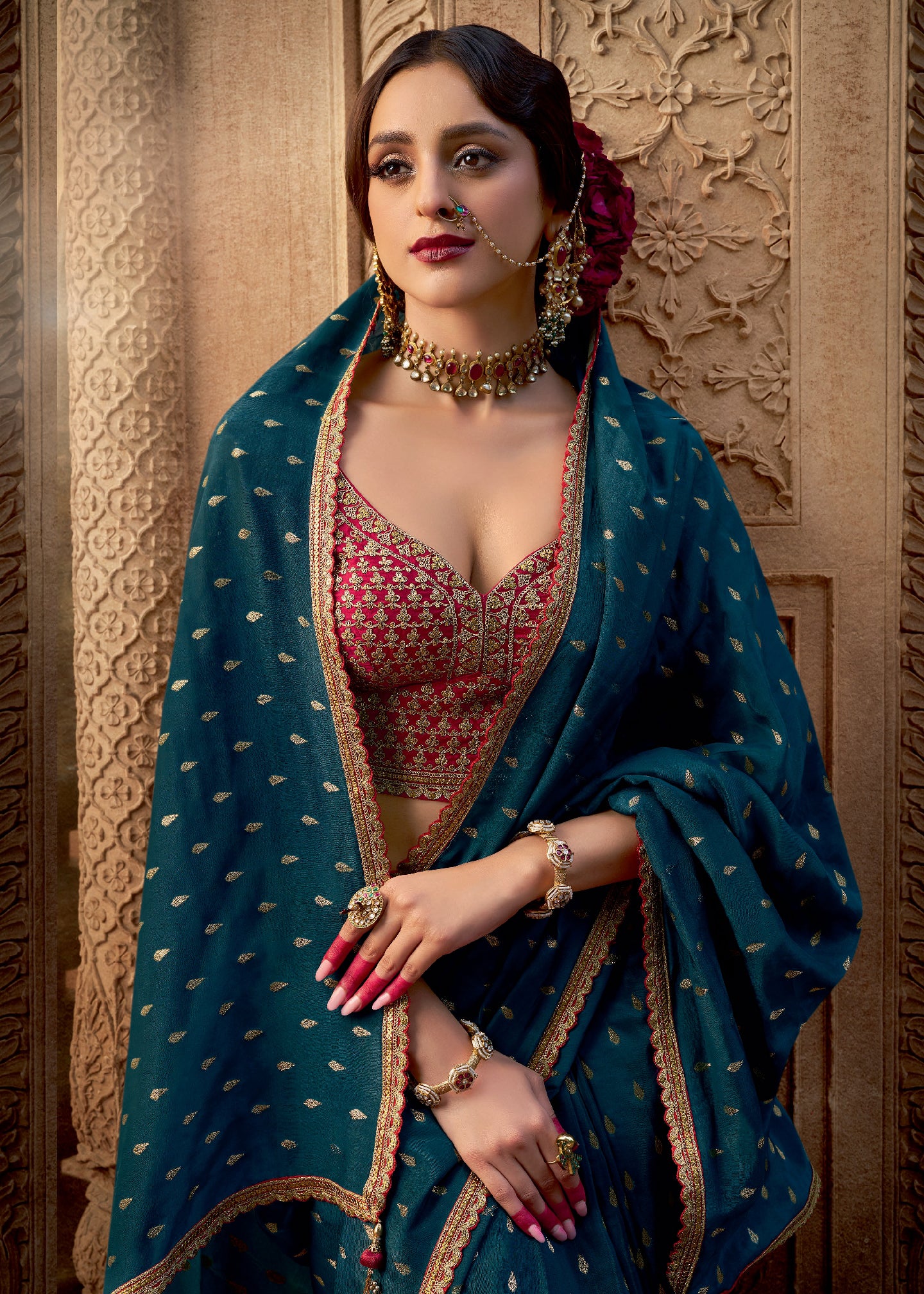Teal Viscose Crepe Saree with Butti Weaving and Embroidered Blouse