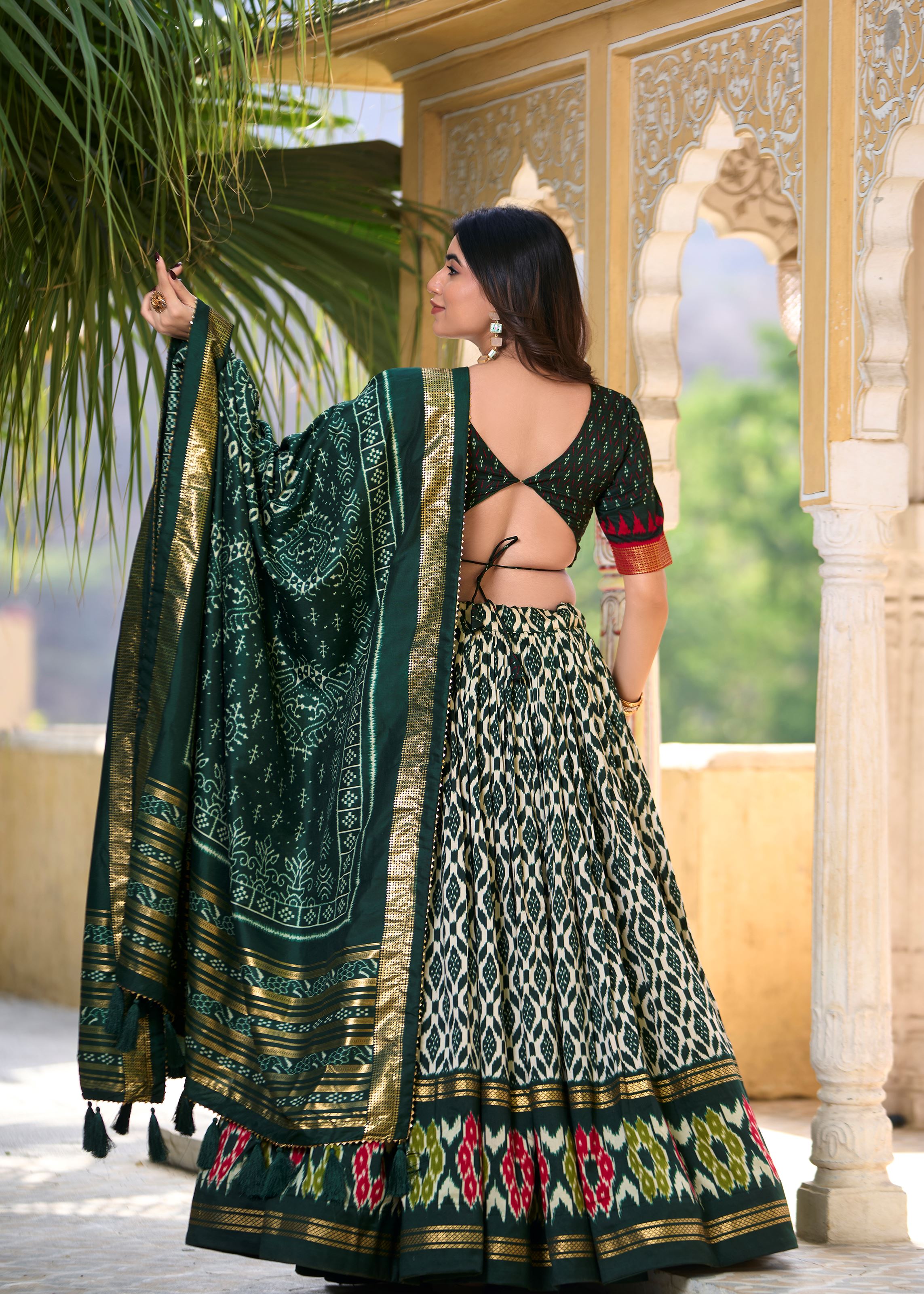 Tradition with a Sparkle Ikkat Printed Green Lehenga in Tussar Silk