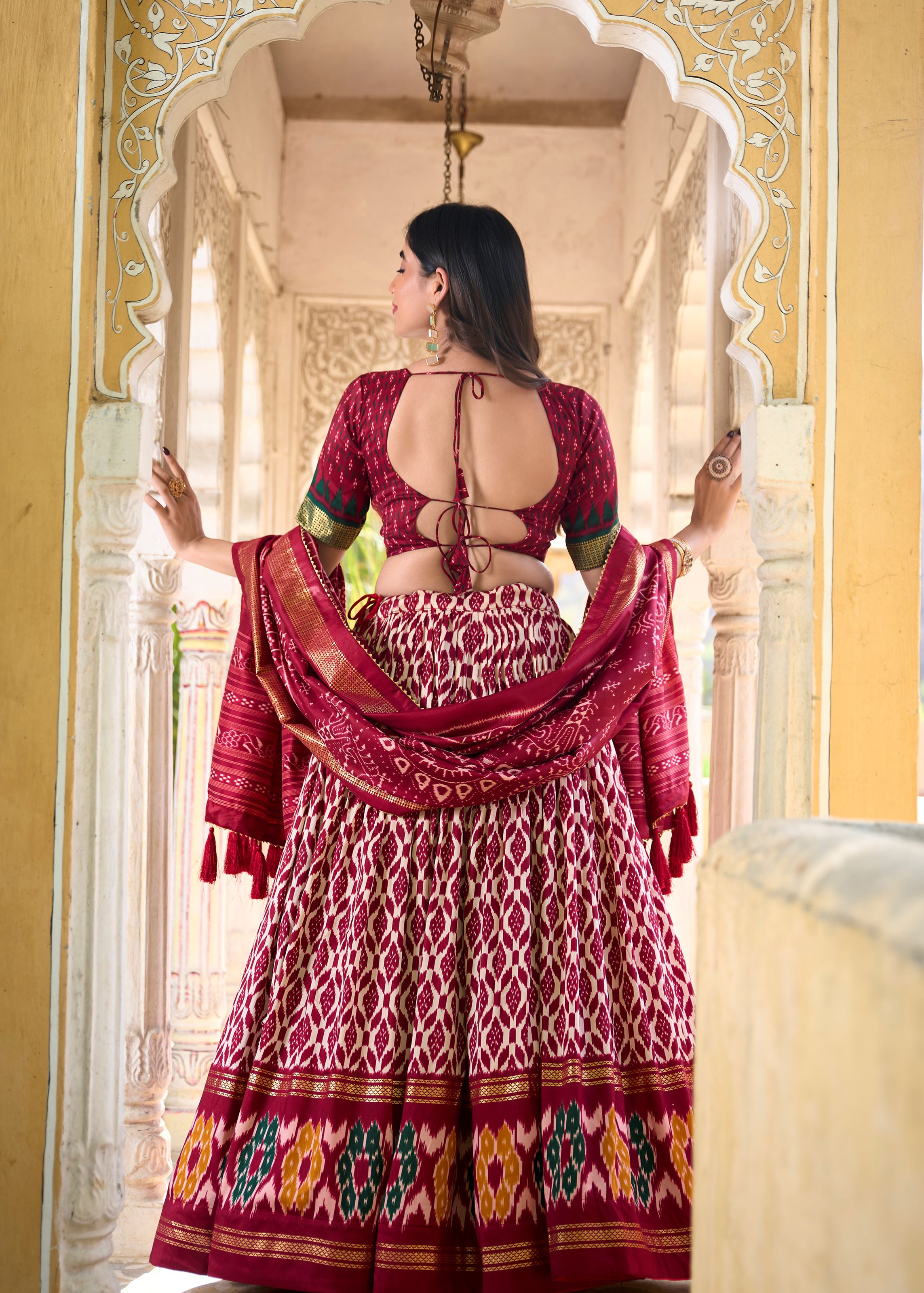 Tradition with a Sparkle Ikkat Printed Maroon Lehenga in Tussar Silk