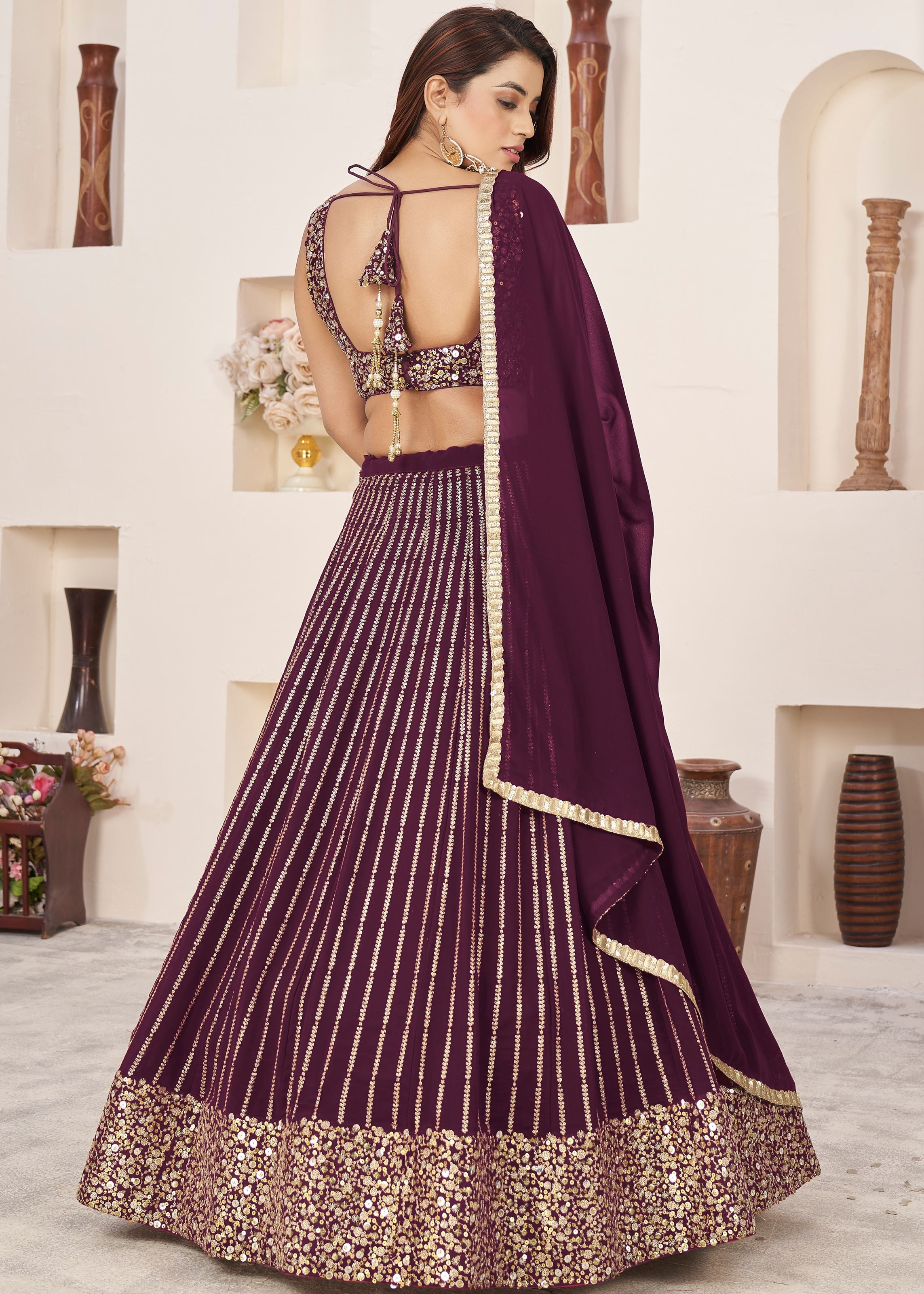 Wine Georgette Lehenga Choli With Sequins Zari Embroidered Work