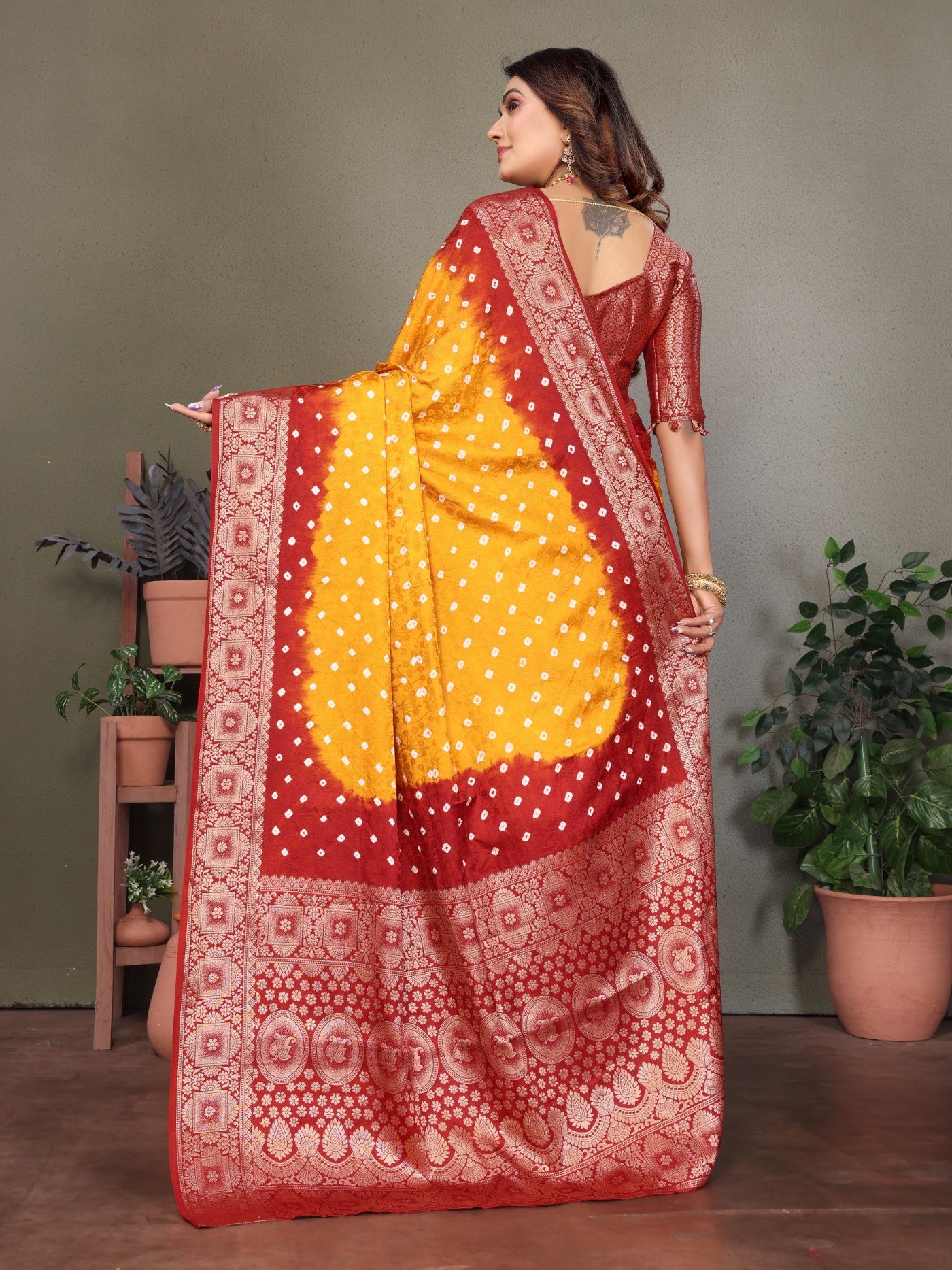Yellow Satin Silk Saree With Bandhej And Zari Weaving