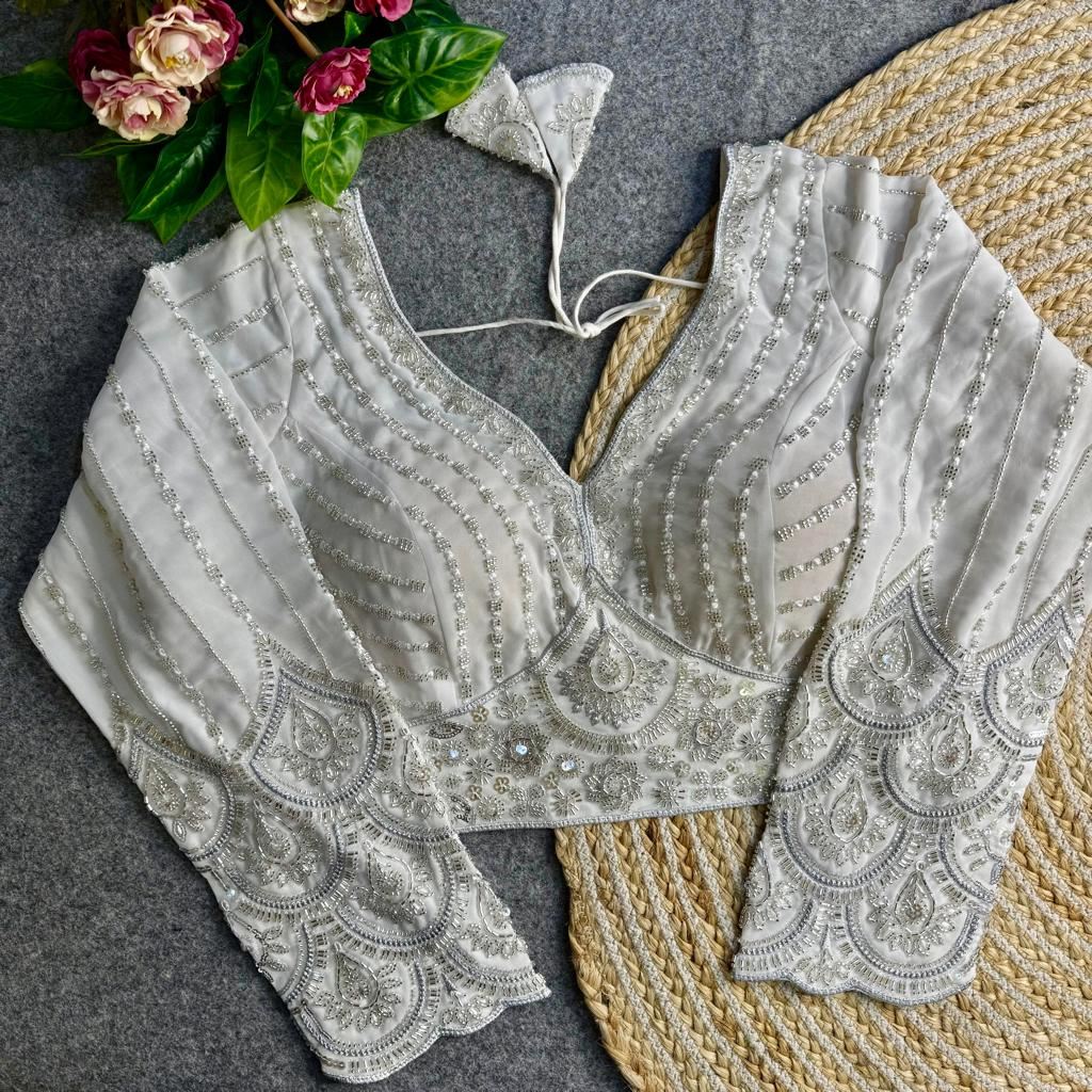 White Georgette Blouse with Heavy Thread Embroidery  Sequins Work