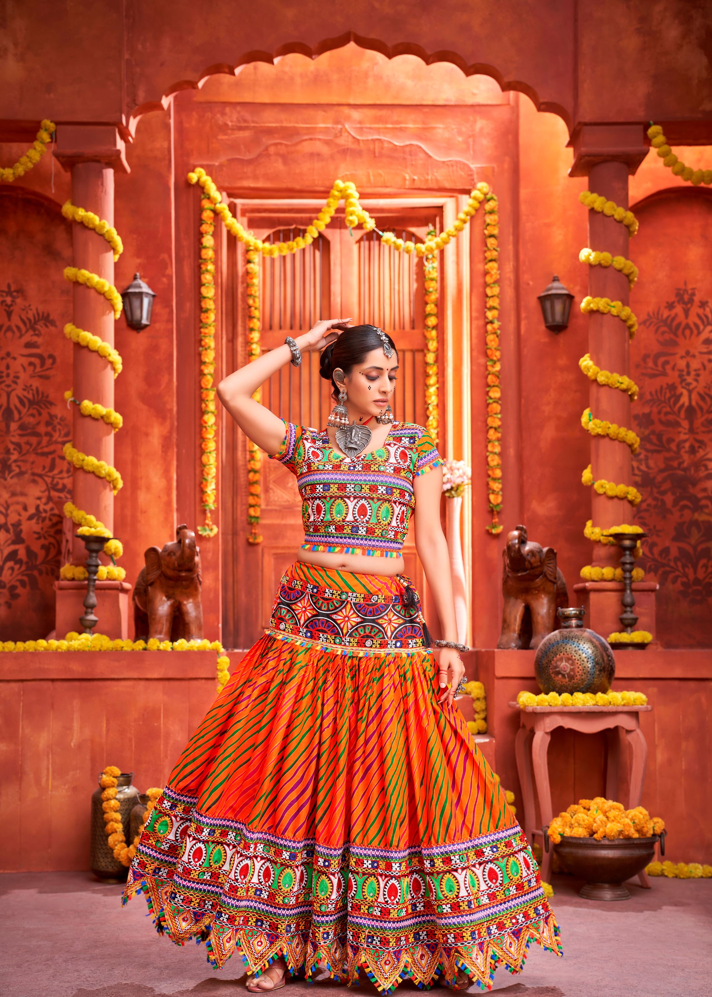 Orange And Royal Blue Navratri Chaniya Choli With Laheriya Print With Gamthi Work And Real Mirror  Work