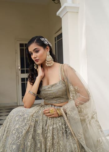 Ivory Butterfly Net Lehenga Choli With Designer Thread Work, Zari Work And Sequence Work Embroidery