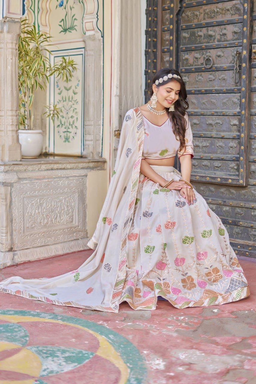 Off-White Lehenga Choli with Sequins, Thread Embroidery, Hand Print & Lace Detailing