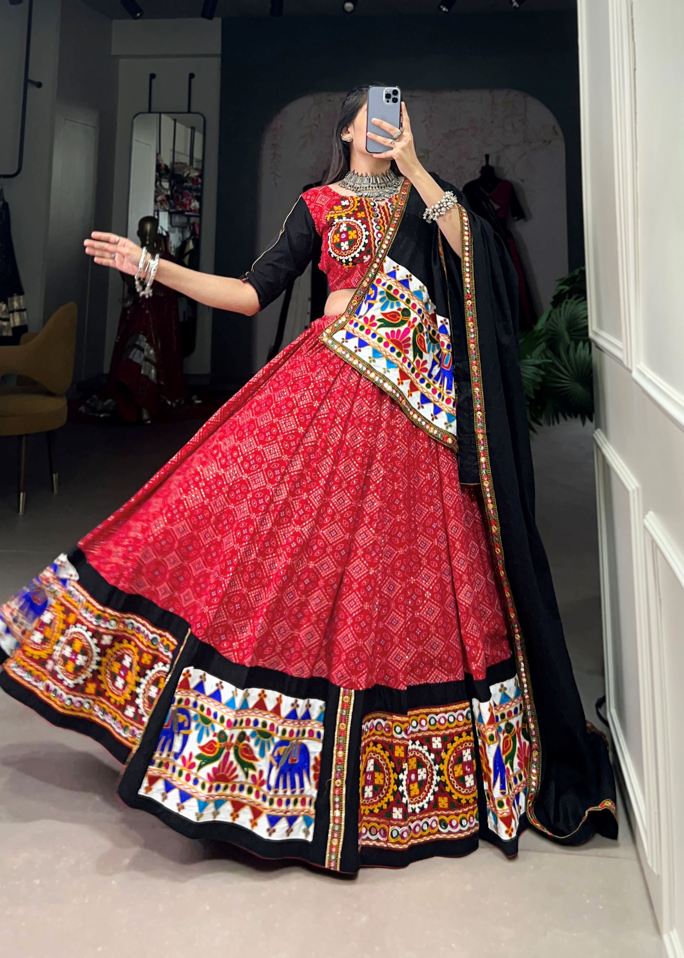 Red Where Tradition Meets Trend: Printed Pure Cotton Lehenga Cholis with Gamthi & Mirror Work"