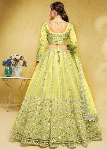 Captivating Lime Yellow Foil Work Net Engagement Wear Lehenga Choli