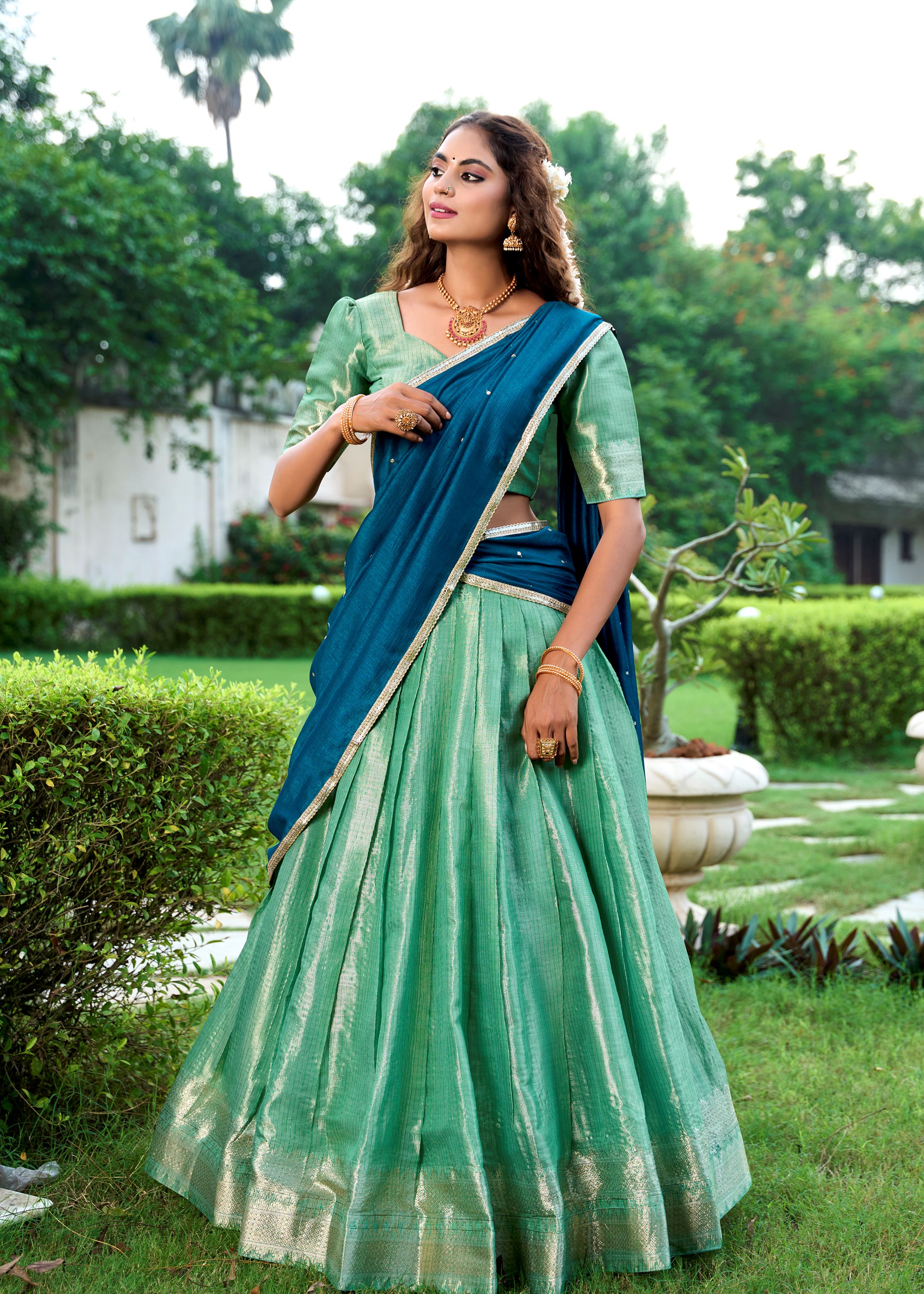 Classic Pista Elegance With A Touch Of Tradition  Kanchipuram Lehenga