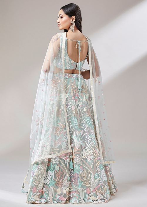 Dazzling Pista Green Sequins Soft Net Engagement Wear Lehenga Choli