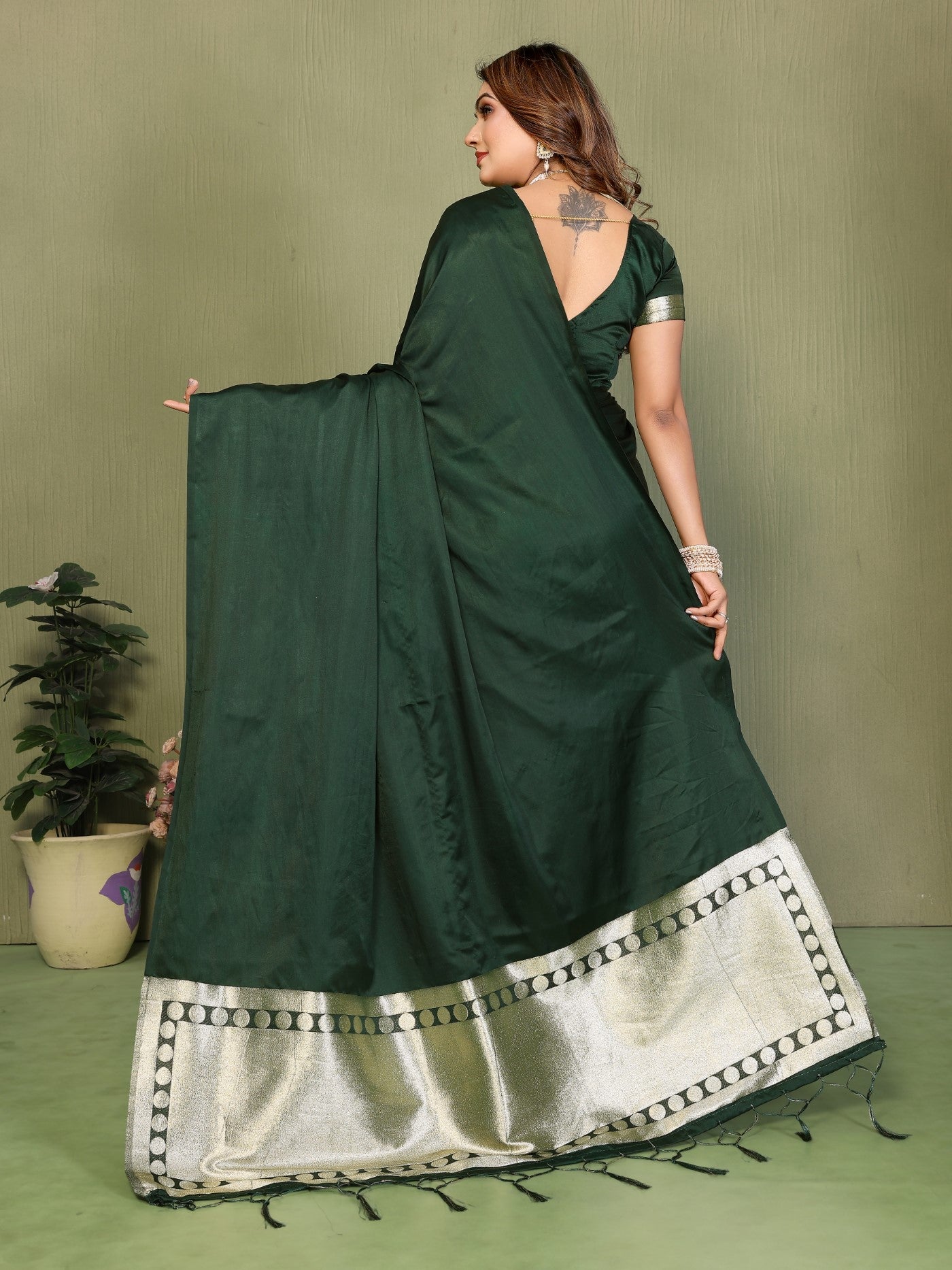 Green Soft Satin Silk Saree With Traditional Zari Weaving