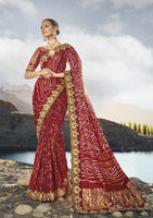Maroon Pure Gajji Bandhej Satin Saree With  Embroidred With Mirror, Moti and Cut Dana Work