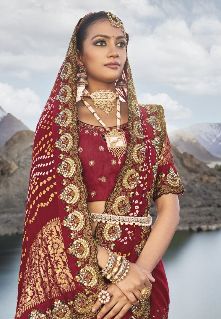 Maroon Pure Gajji Bandhej Satin Saree With  Embroidred With Mirror, Moti and Cut Dana Work