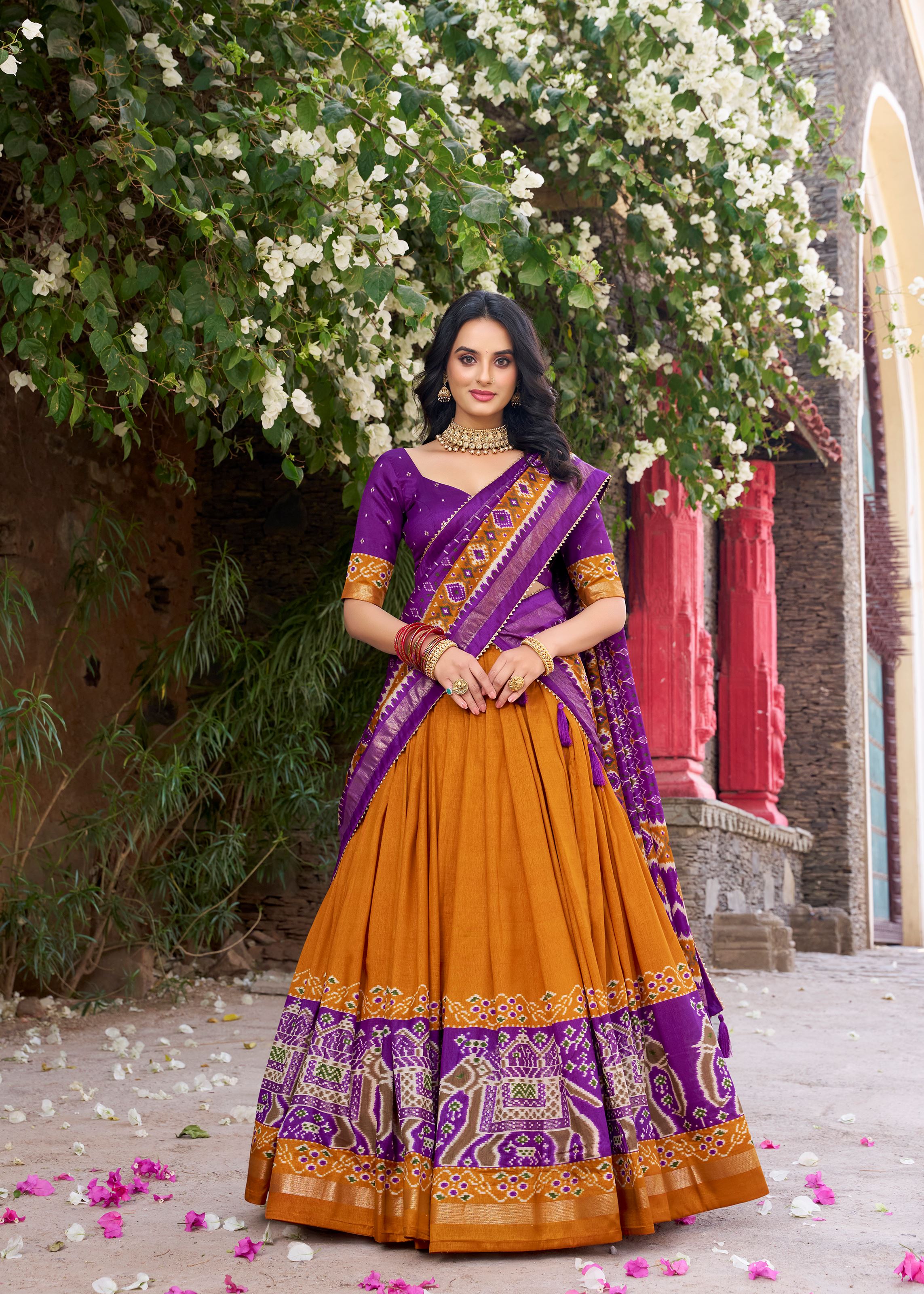 Mustard  Perfection Patola Printed Tussar Silk Lehenga with Foil Highlights