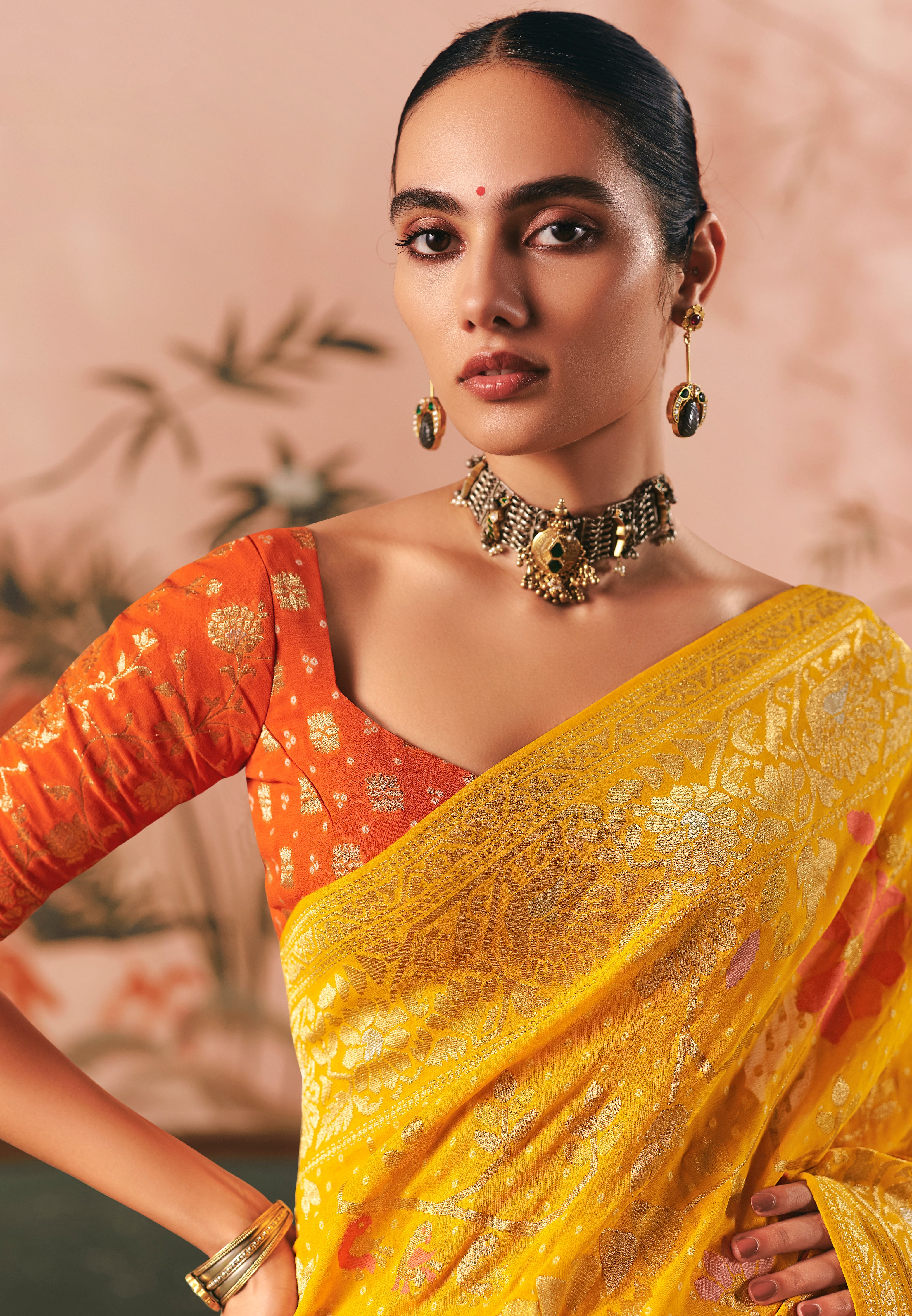 Mustard Saree With  Designer Bandhej Weaving Work With Beutifull Tassles Attached
