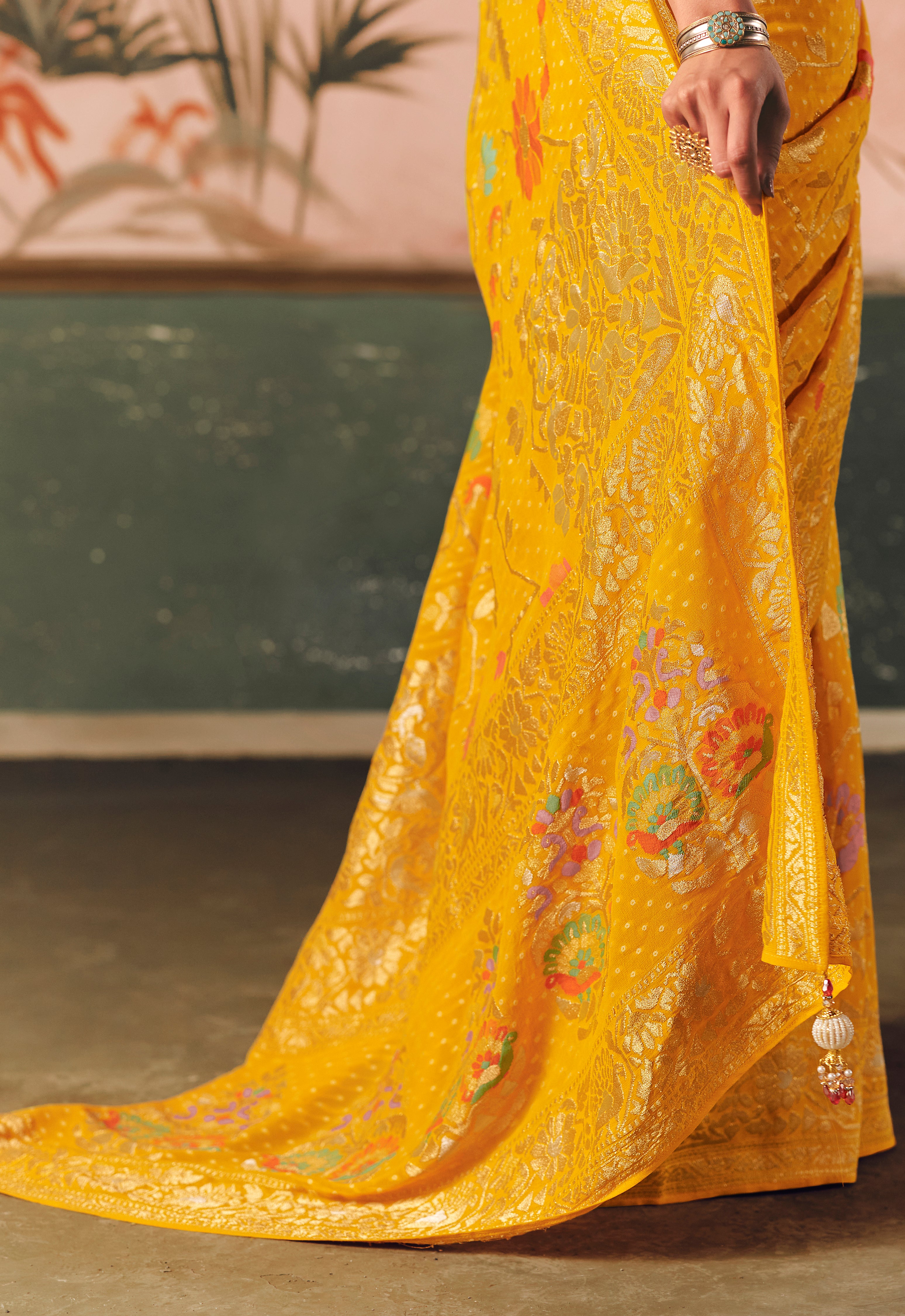 Mustard Saree With  Designer Bandhej Weaving Work With Beutifull Tassles Attached