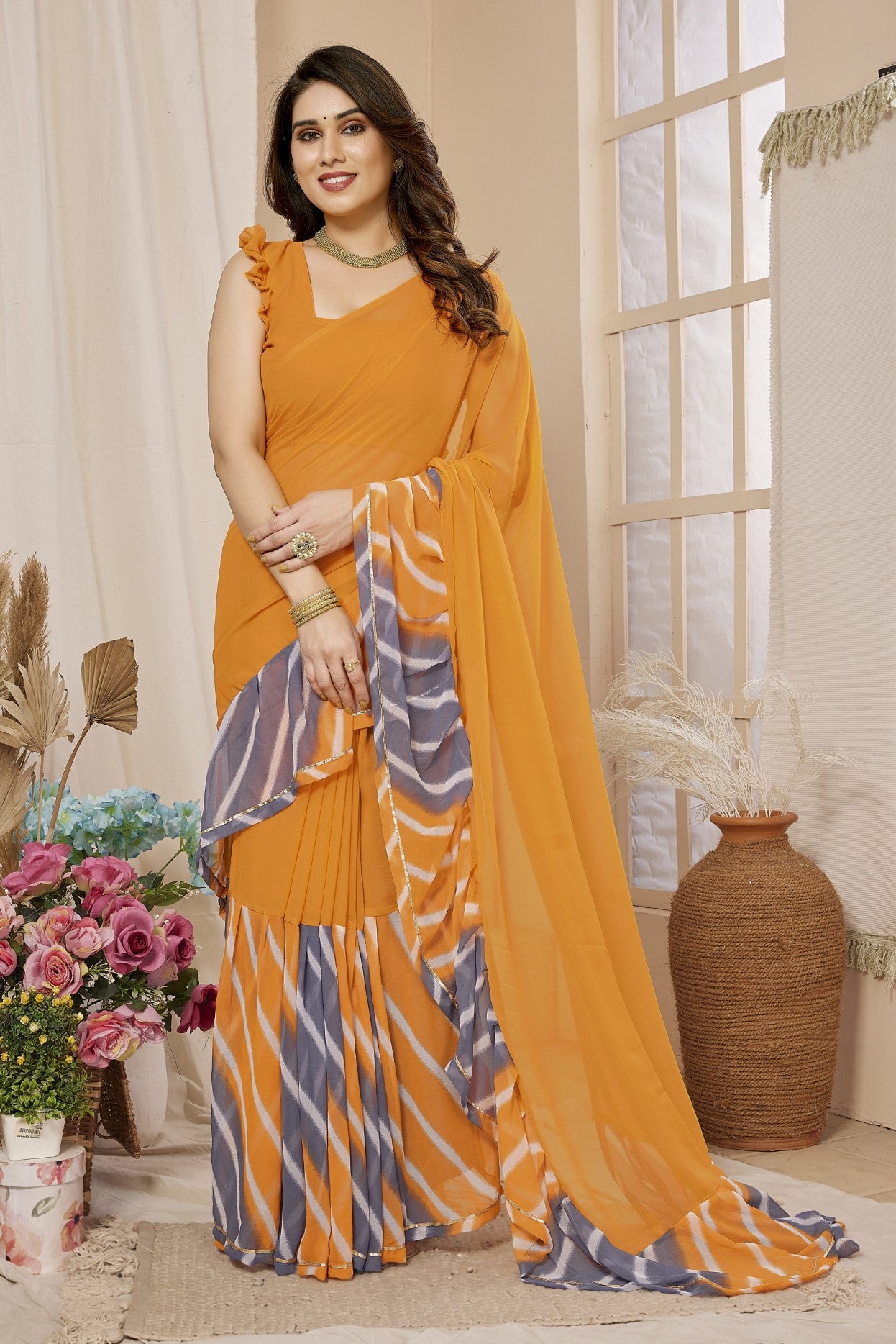 Orange Georgette Ruffle Saree