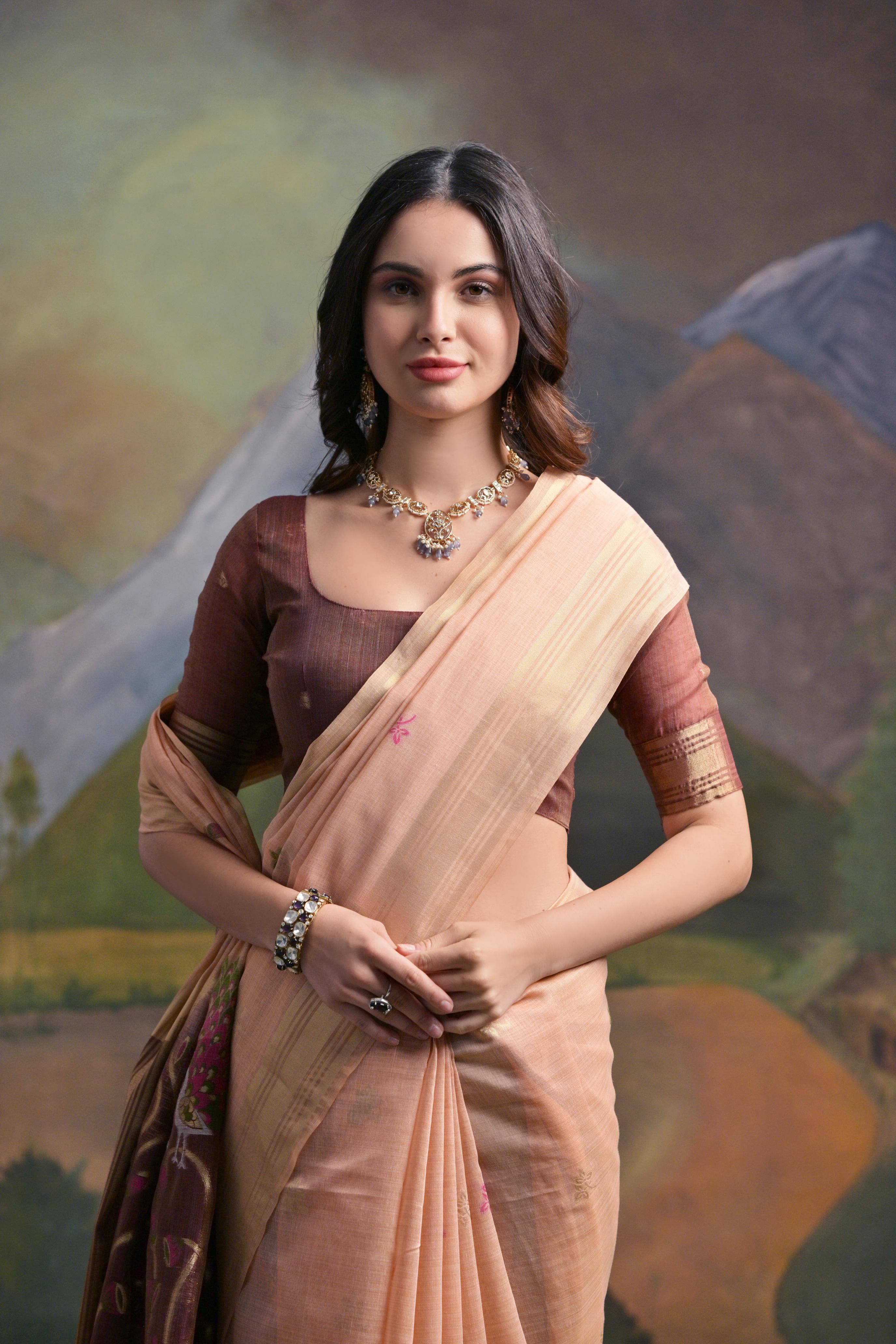 Peach Muga Cotton Saree with Peacock Pallu and Butti Weaves