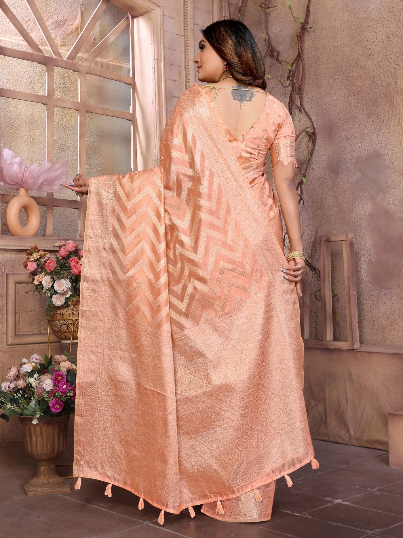 Peach Soft Organza Silk Saree With Elegant Weaving