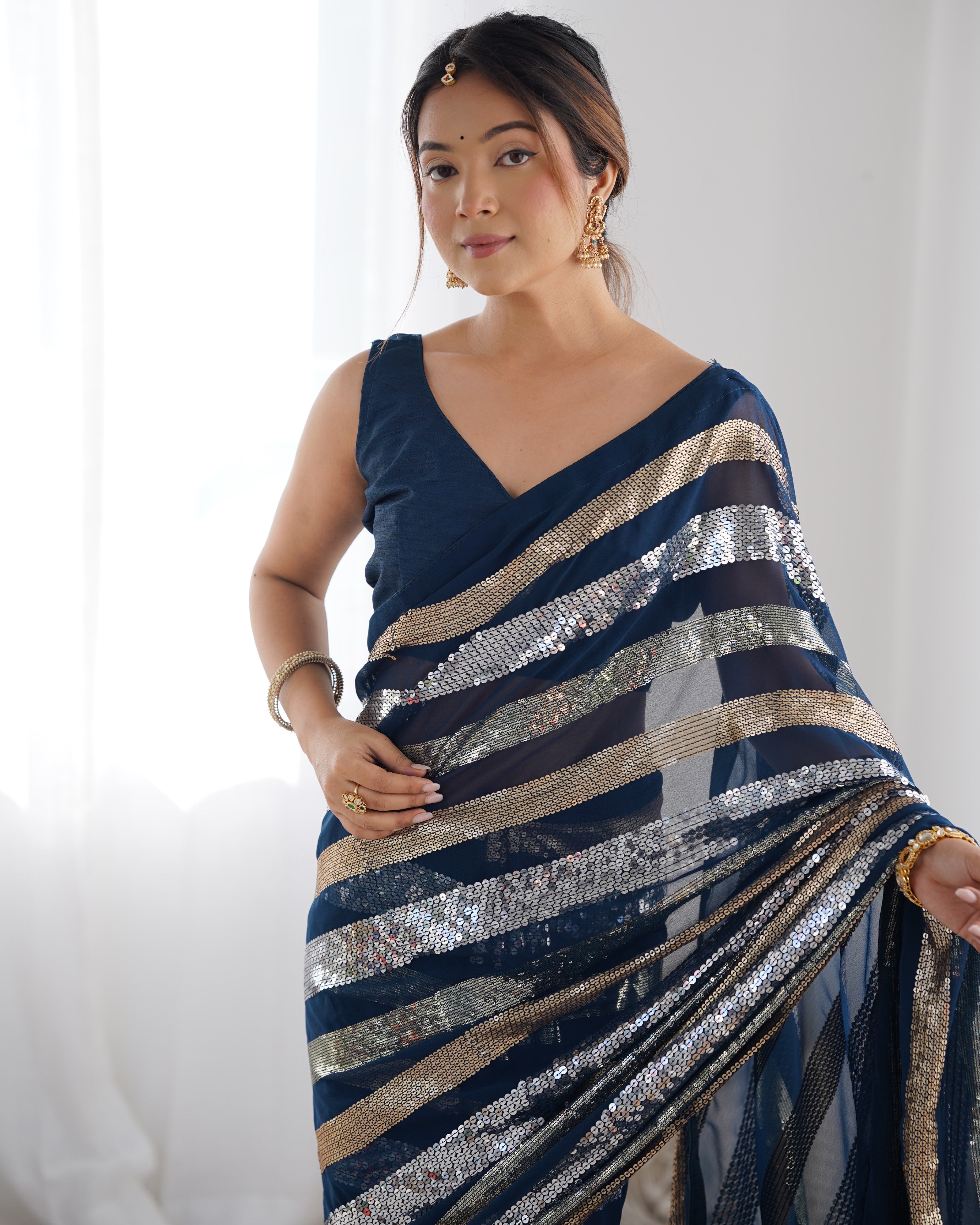 Petrol Beautiful Georgette Fabric Sequins Work Ceremonial Saree