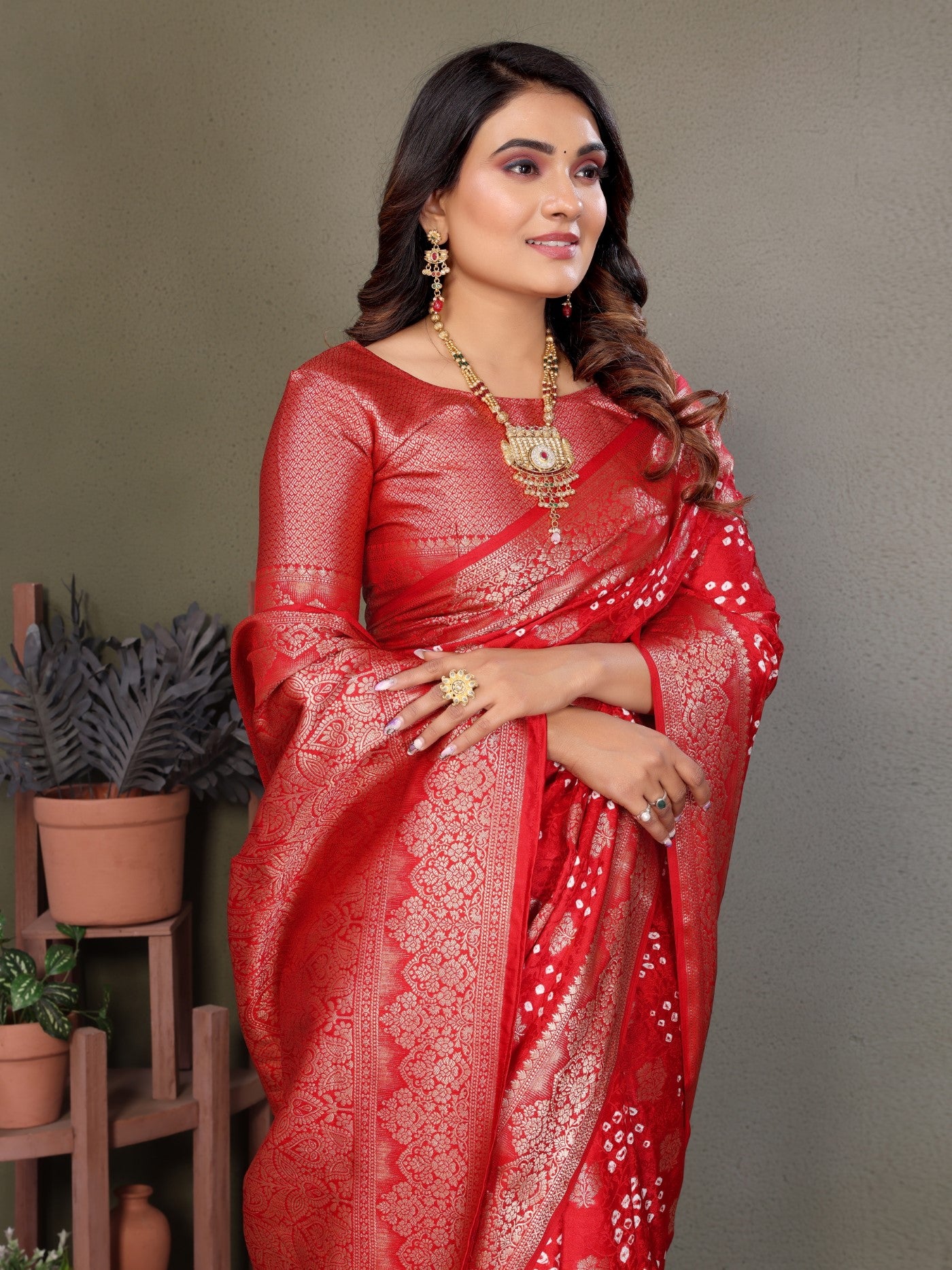 Red Bandhej Silk Saree With Elegant Zari Weaving