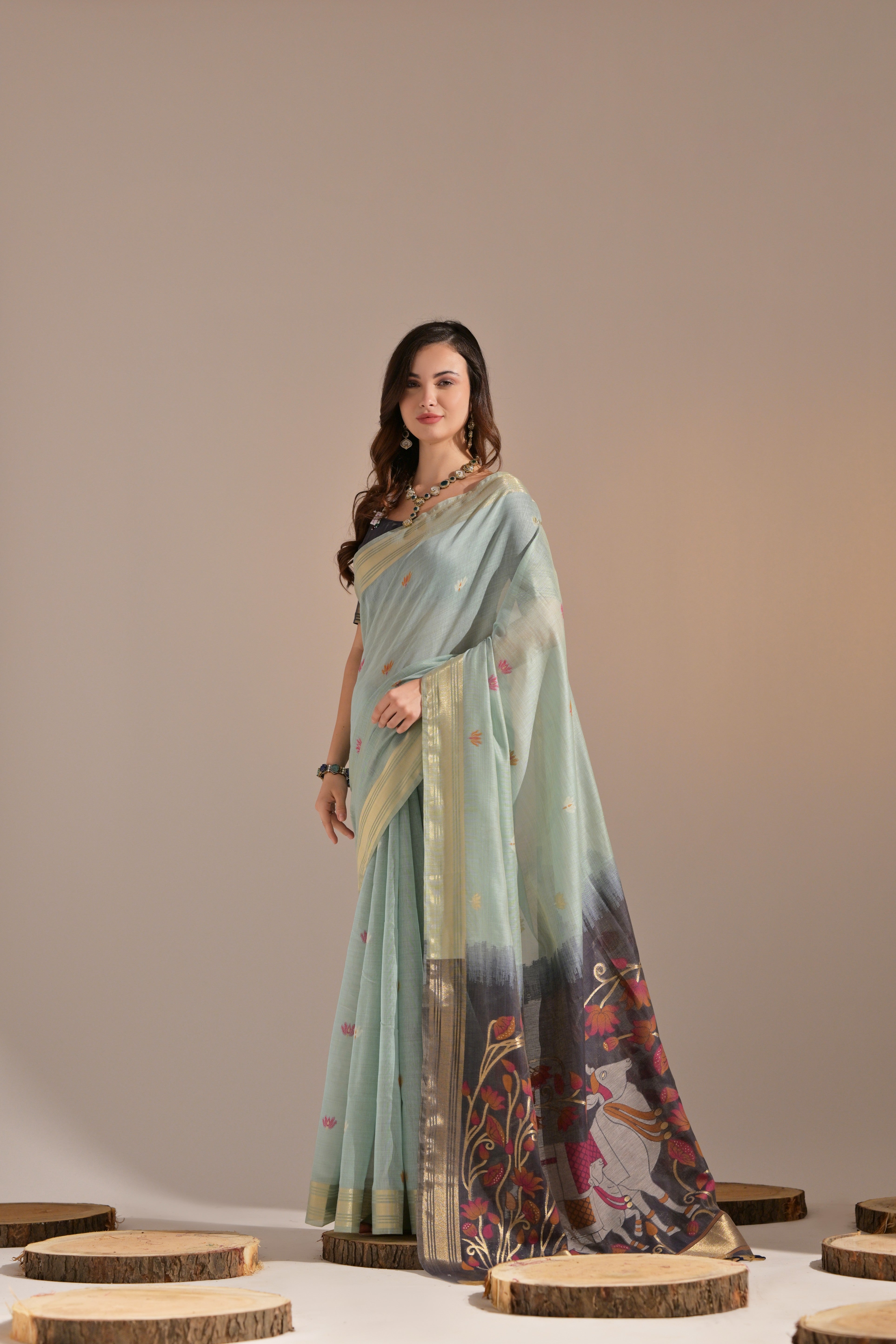 Sea-Green Muga Cotton Saree with Cow Design and Butti Weaves