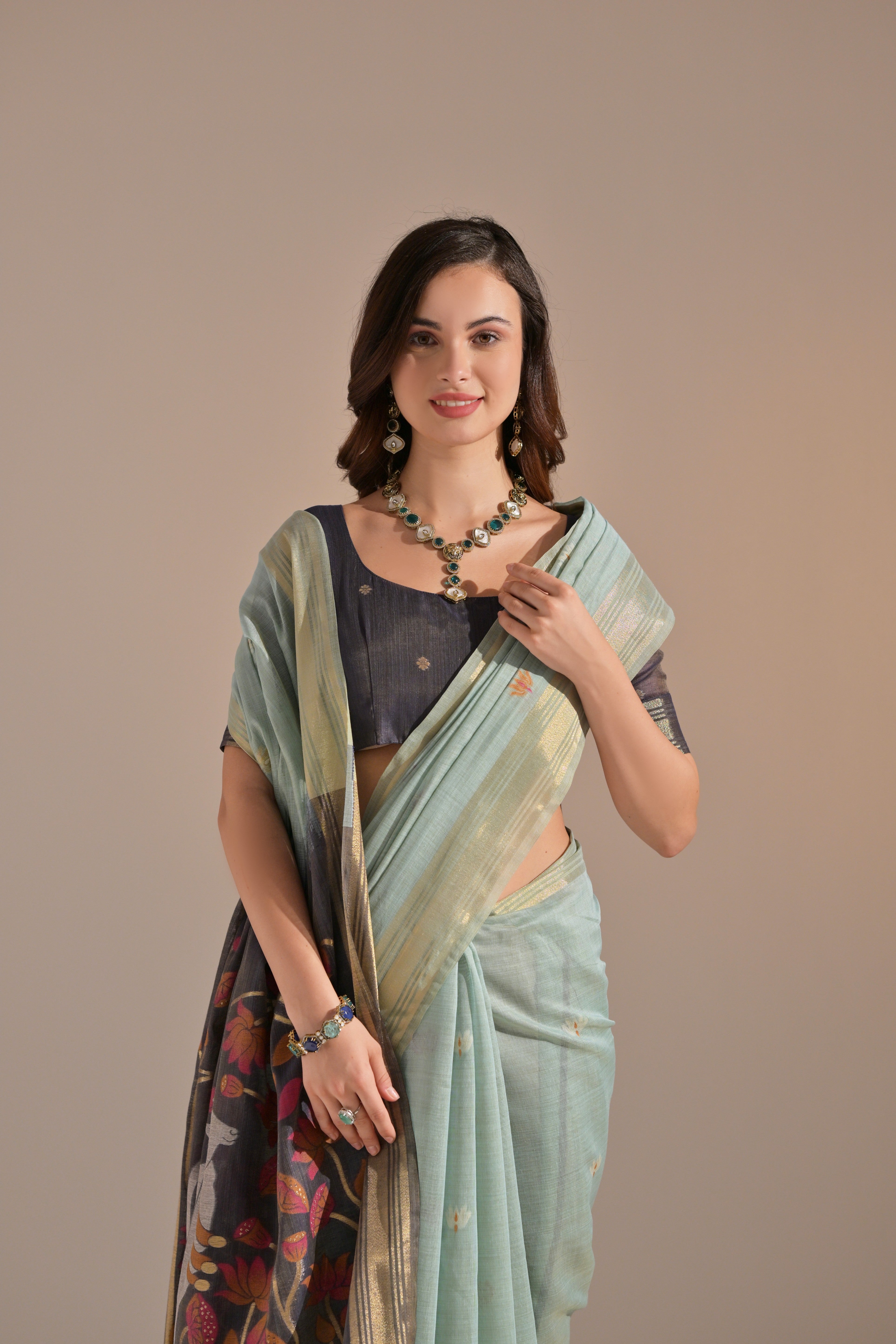 Sea-Green Muga Cotton Saree with Cow Design and Butti Weaves
