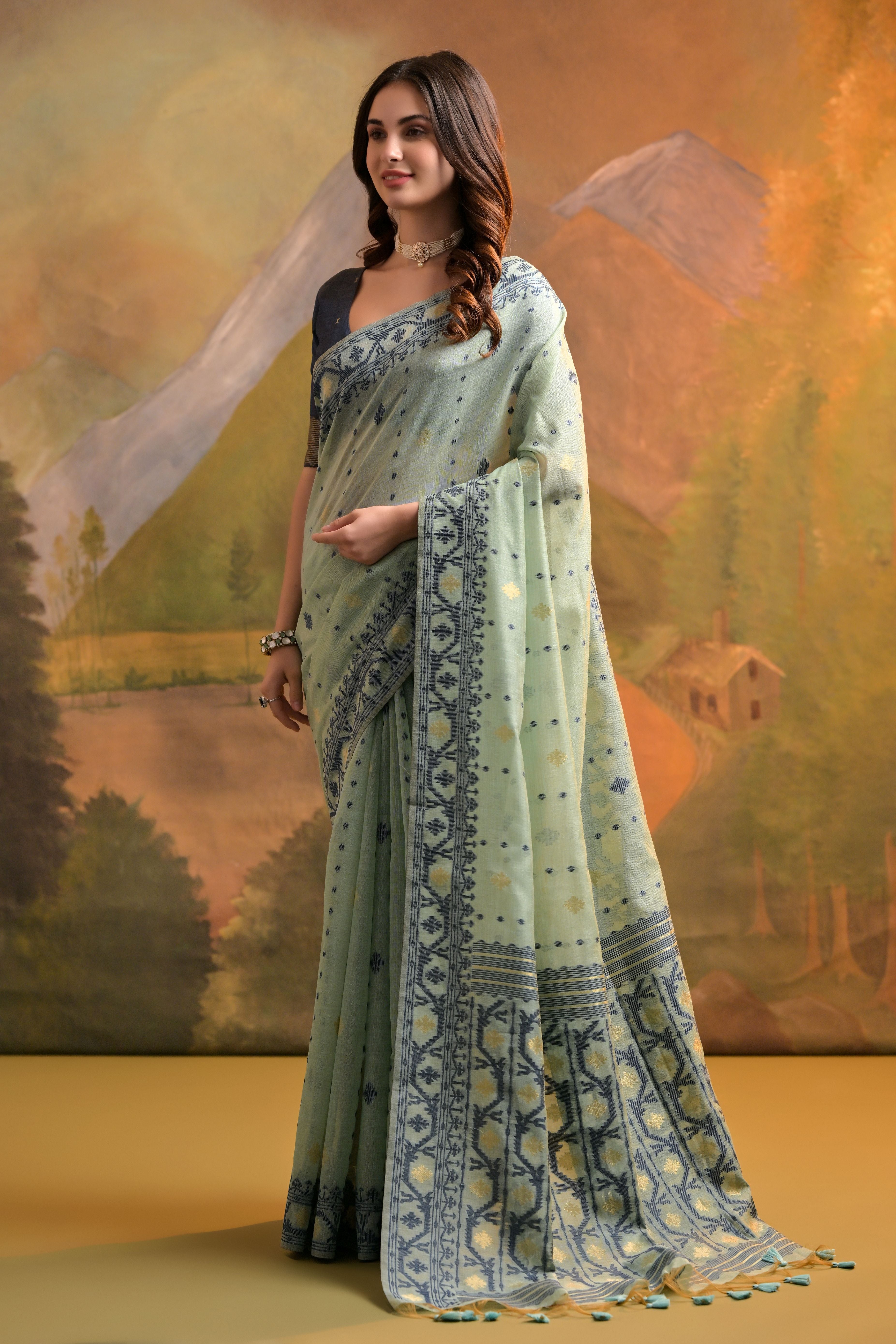 Sea-Green Muga Cotton Saree with Thread Butti Weaves
