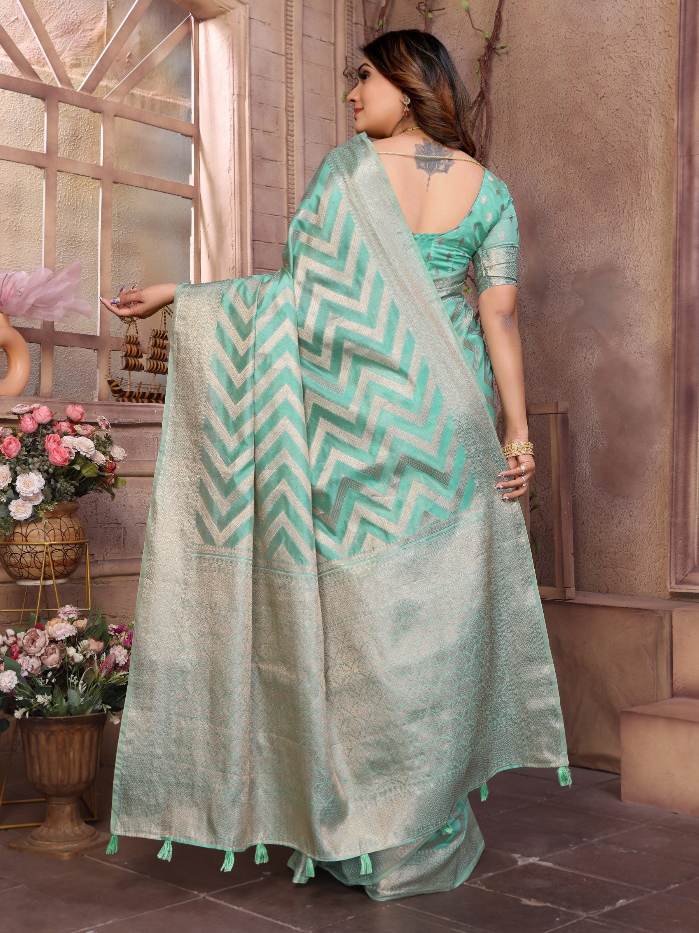 Sea Green Soft Organza Silk Saree With Elegant Weaving